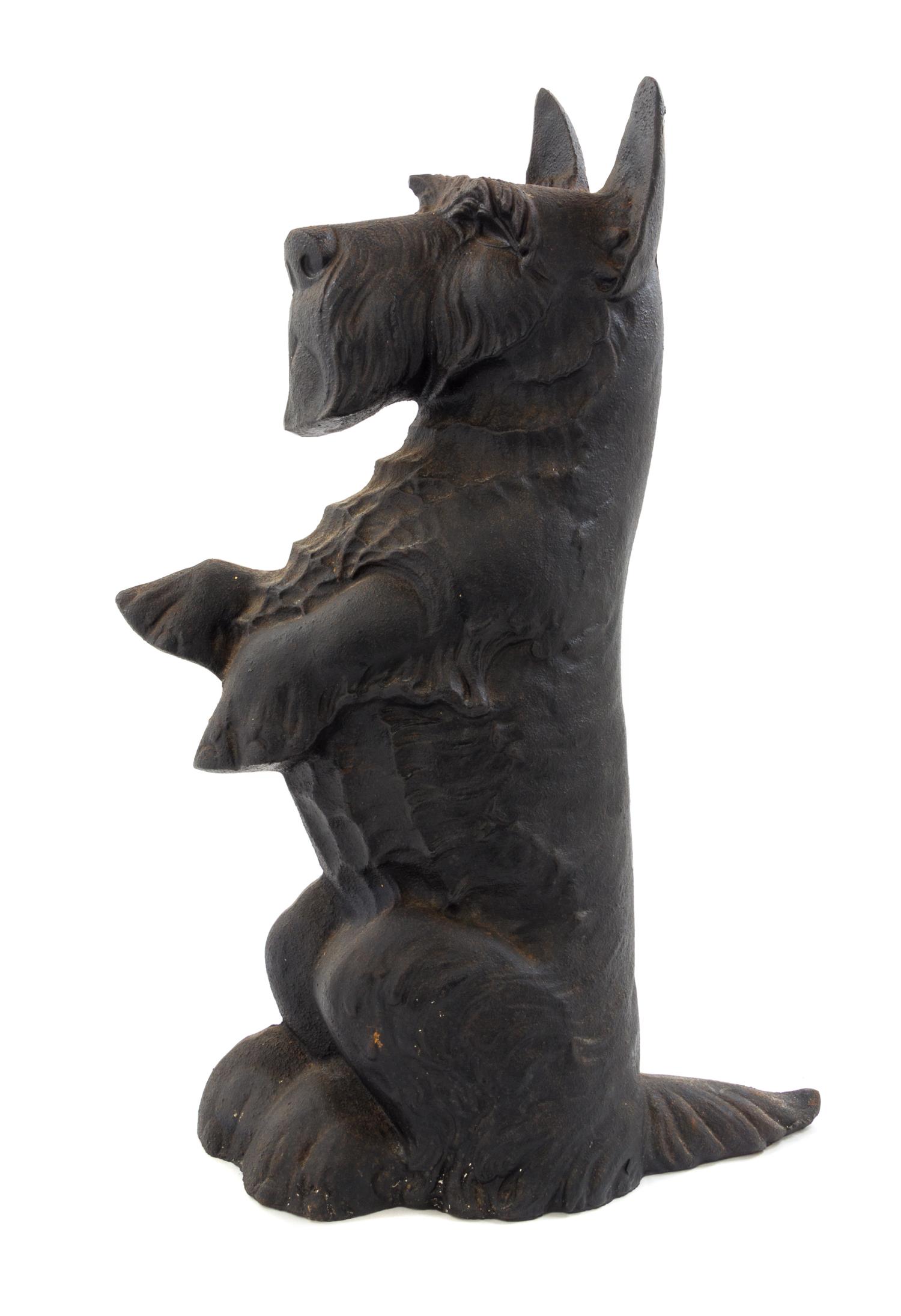 A Cast Iron Doorstop Height 16 1/2 inches.