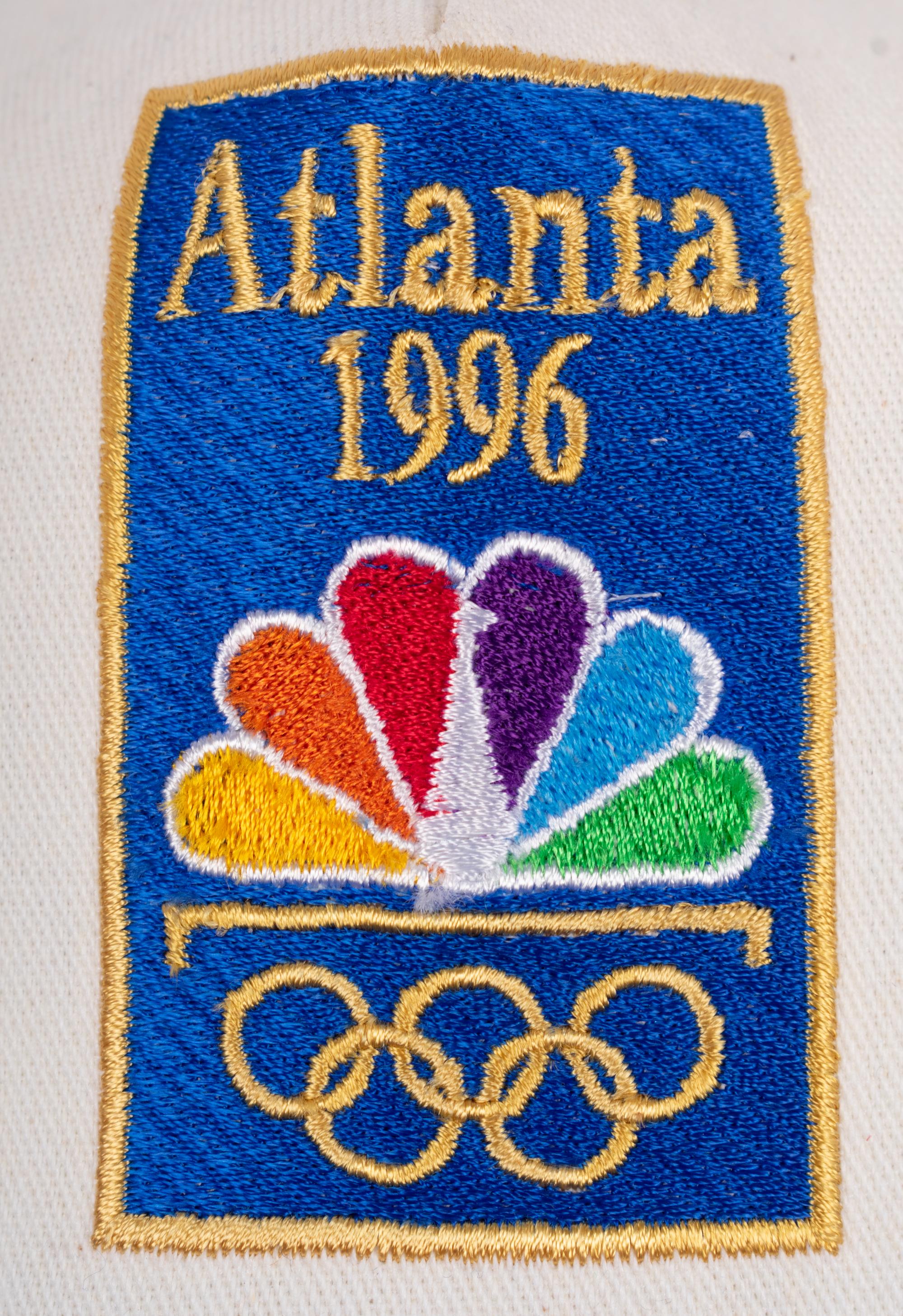 (Sports) A group 7 pieces of memorabilia and ephemera from Olympic games, comprising: