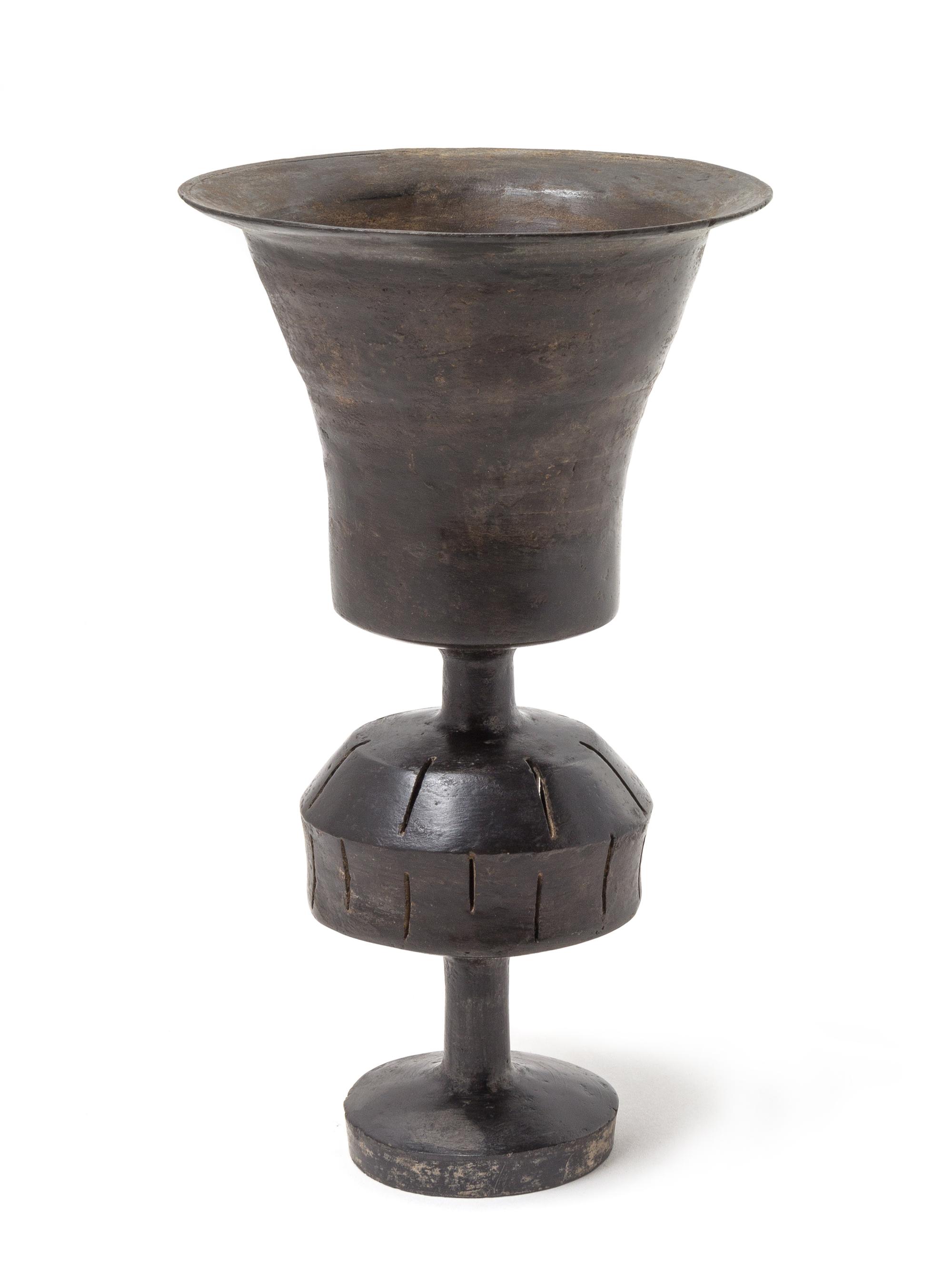 A Burnished Black Eggshell Pottery Stem Cup Height 8 1/4 inches. — NEOLITHIC PERIOD, 2500-2000 B.C.