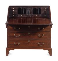 A George III Carved Mahogany Slant-Front Bureau