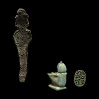 An Egyptian Bronze Osiris, an Egyptian Faience Shu, and an Egyptian Faience Scarab