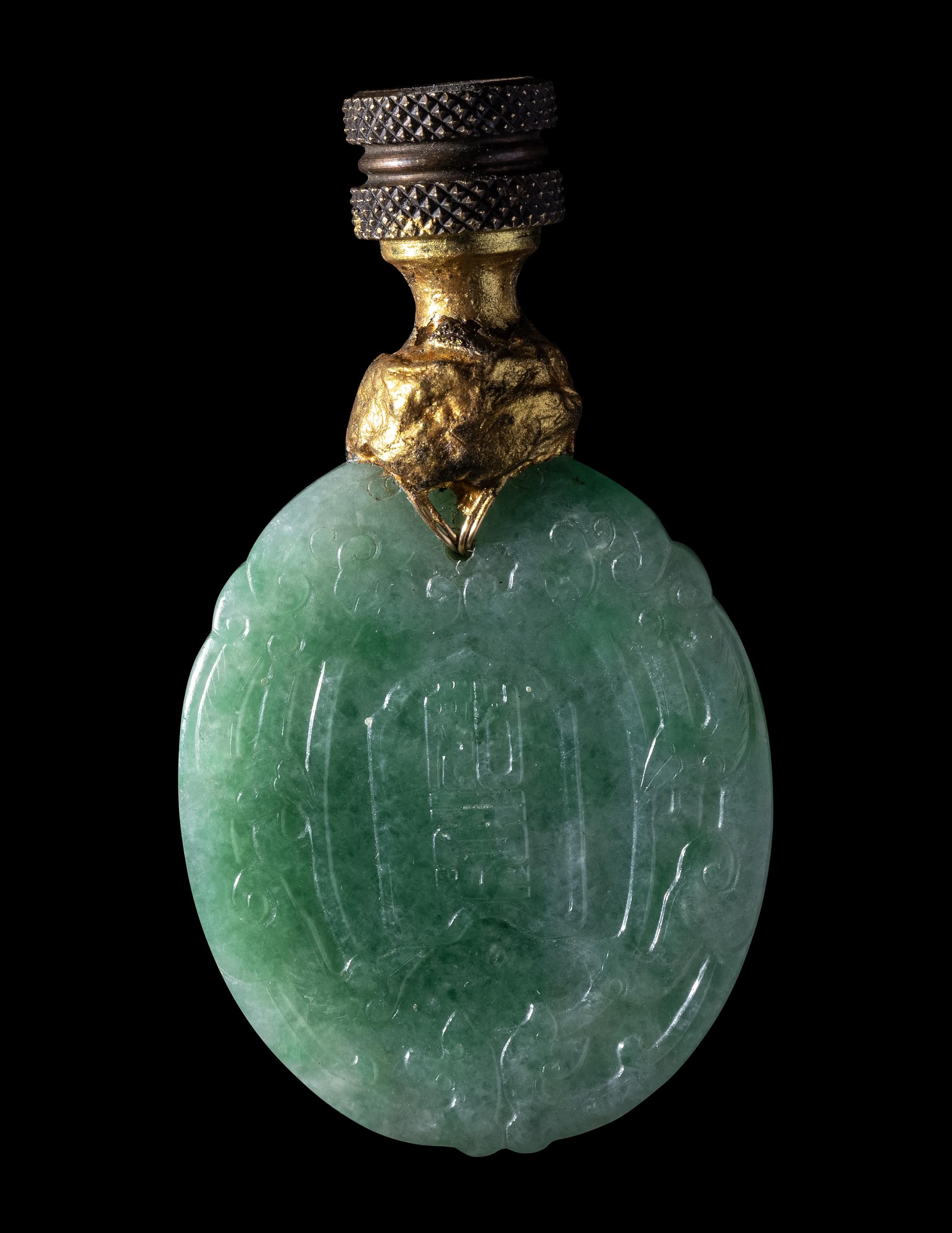 A Chinese Apple Green Jadeite Pendant