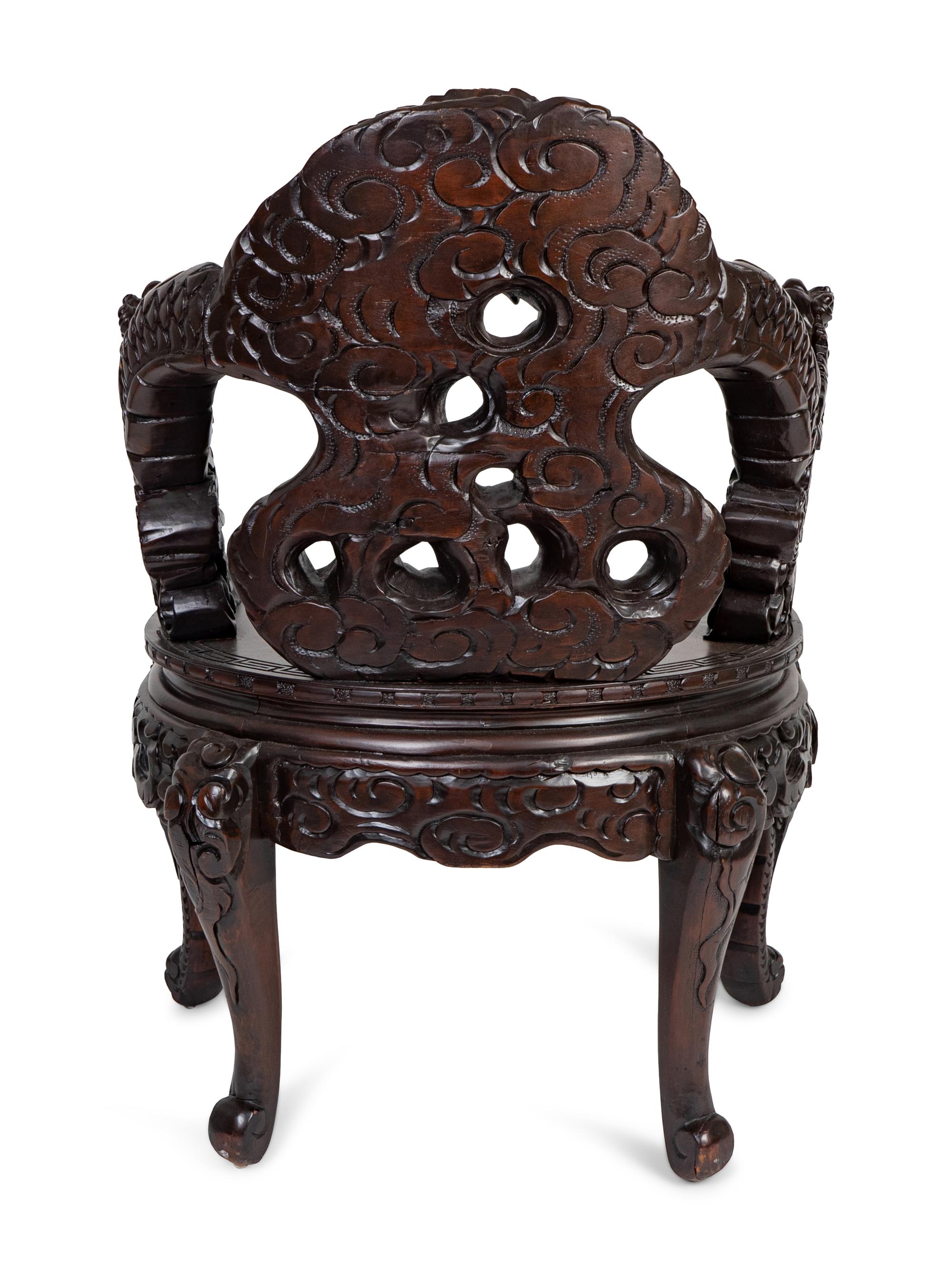 A Japanese Carved Hardwood Armchair
