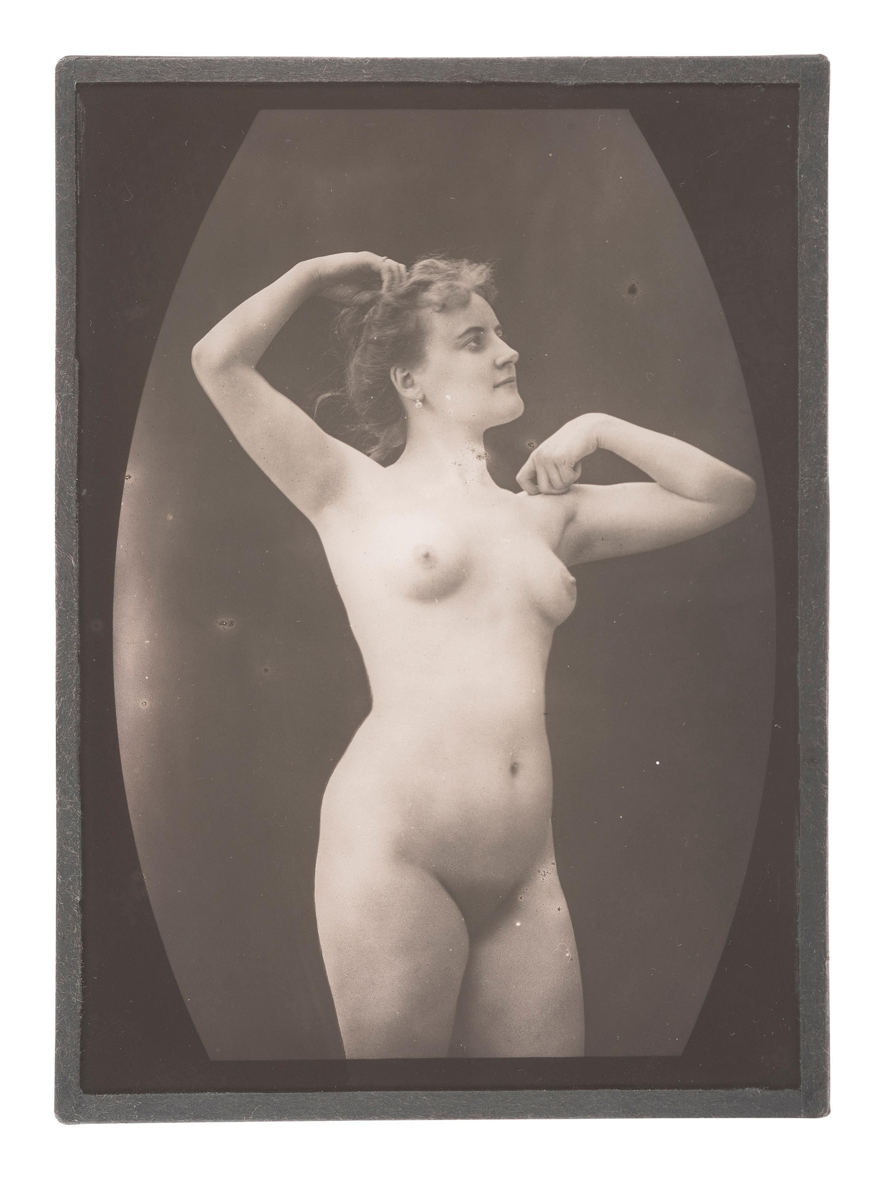 [EARLY PHOTOGRAPHY]. Collection of cased images, glass negatives, and postcards of nude subjects.