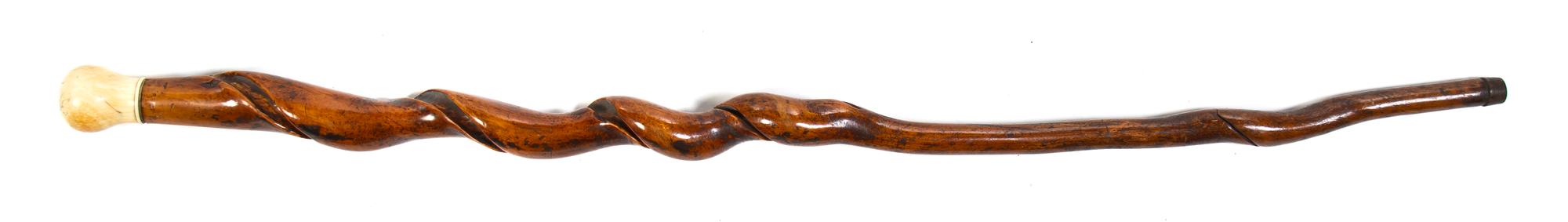 An Ivory Mounted Walking Stick, Height overall 37 1/2 x height of handle 2 inches.