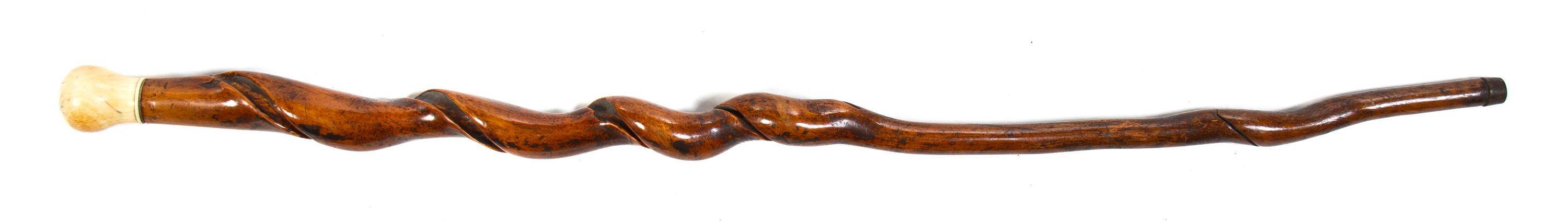 An Ivory Mounted Walking Stick, Height overall 37 1/2 x height of handle 2 inches.