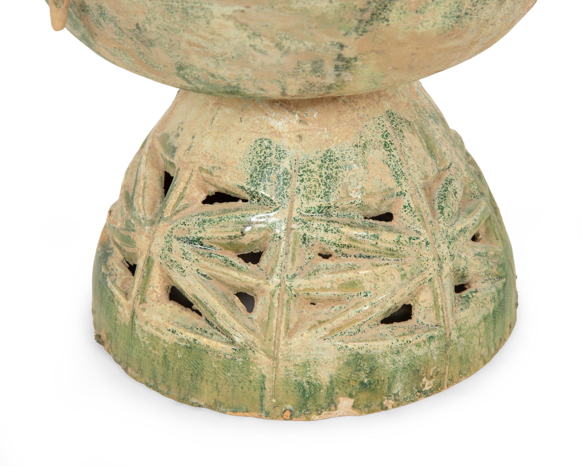 A Han Pottery Phoenix Oil Lamp