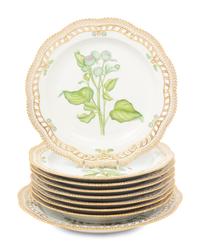 A Group of Eight Royal Copenhagen Flora Danica Reticulated Porcelain Dinner Plates and a Serving Dish