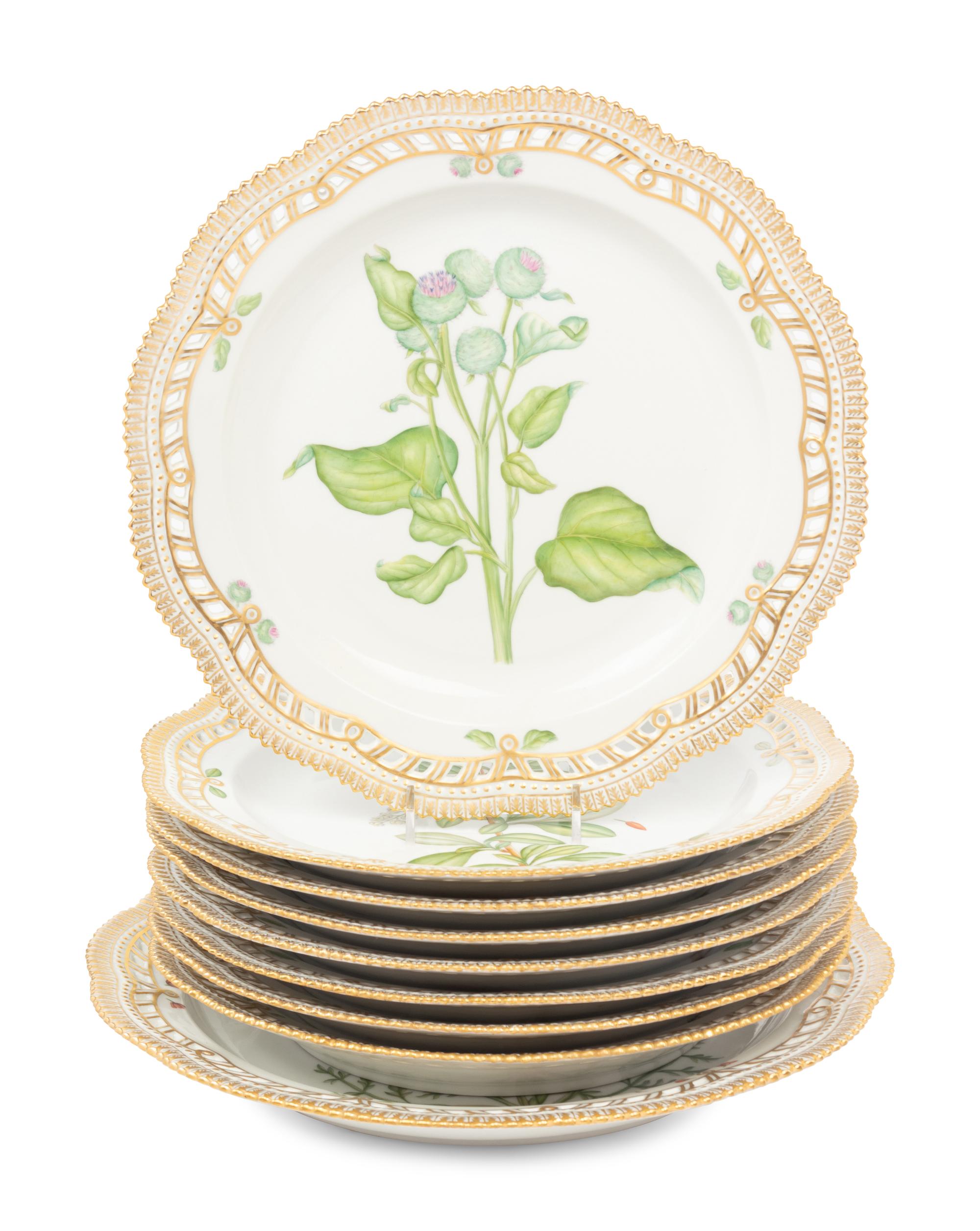 A Group of Eight Royal Copenhagen Flora Danica Reticulated Porcelain Dinner Plates and a Serving Dish