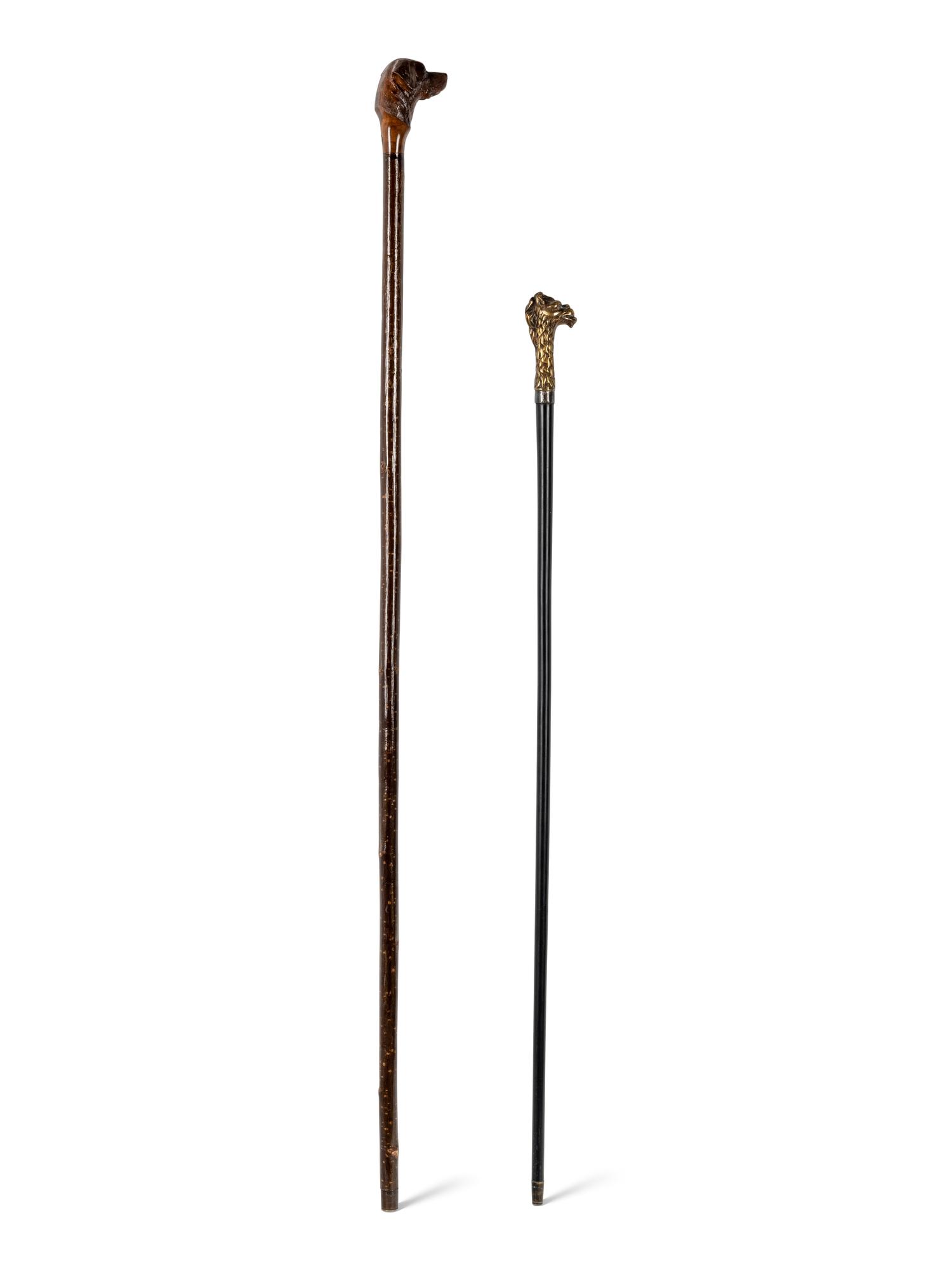 Two Figural Walking Sticks or Canes