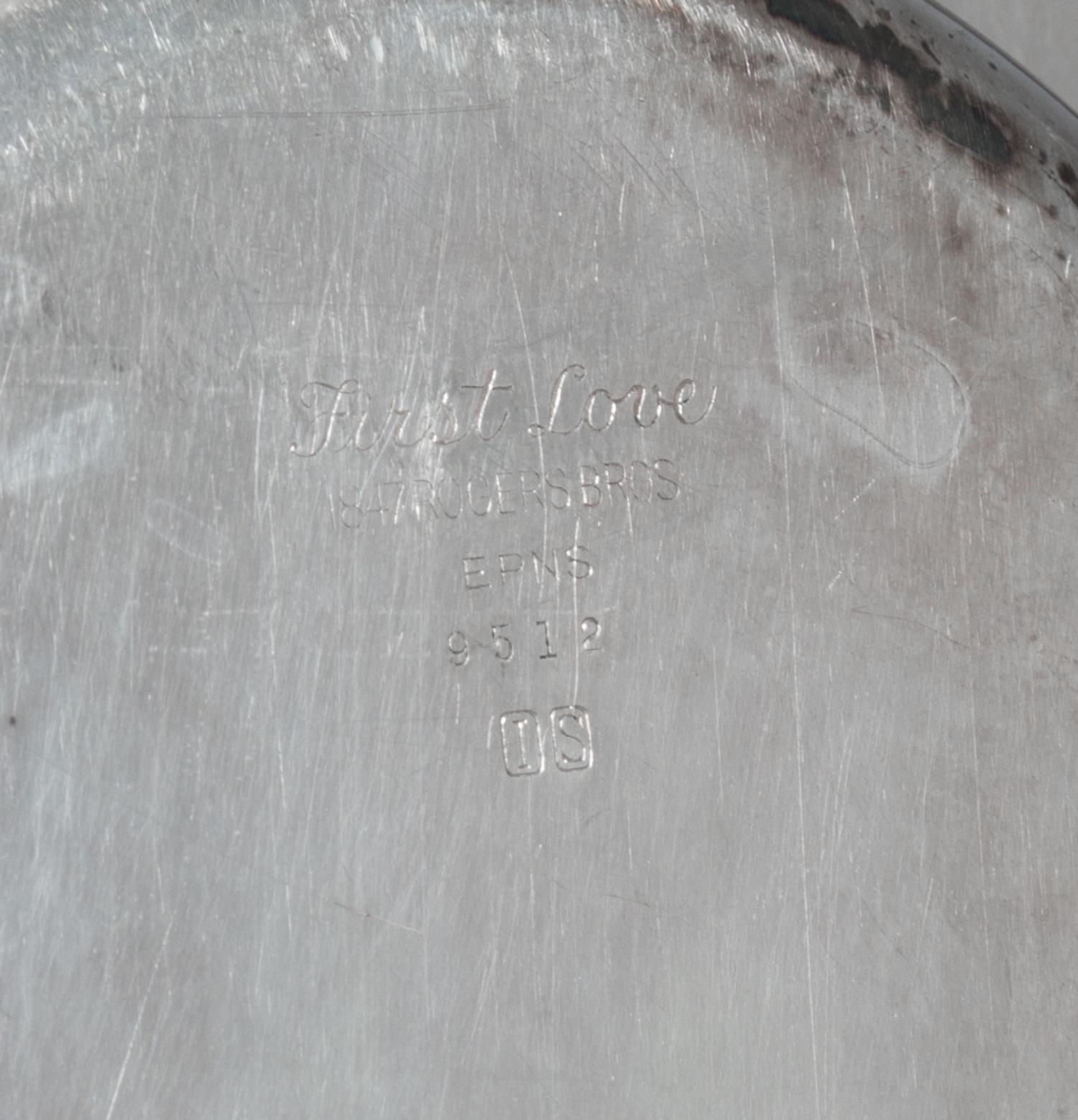 An American Silver-Plate Covered Entree Dish,, Roger Bros., 20th Century, of oval, handled form with cast foliate decoration.