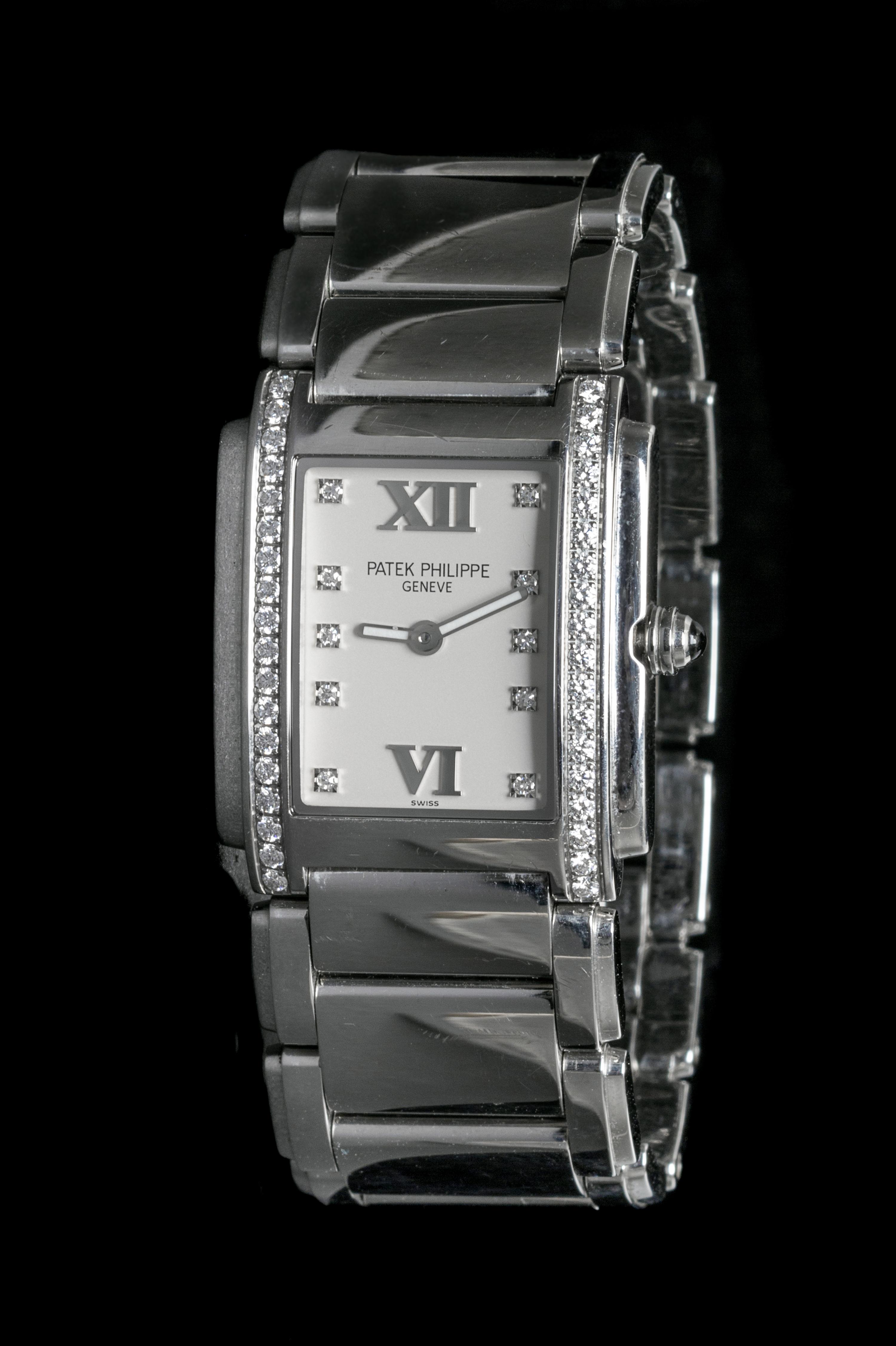 A Stainless Steel and Diamond Ref. 4910/10A Twenty-4 Wristwatch, Patek Philippe,