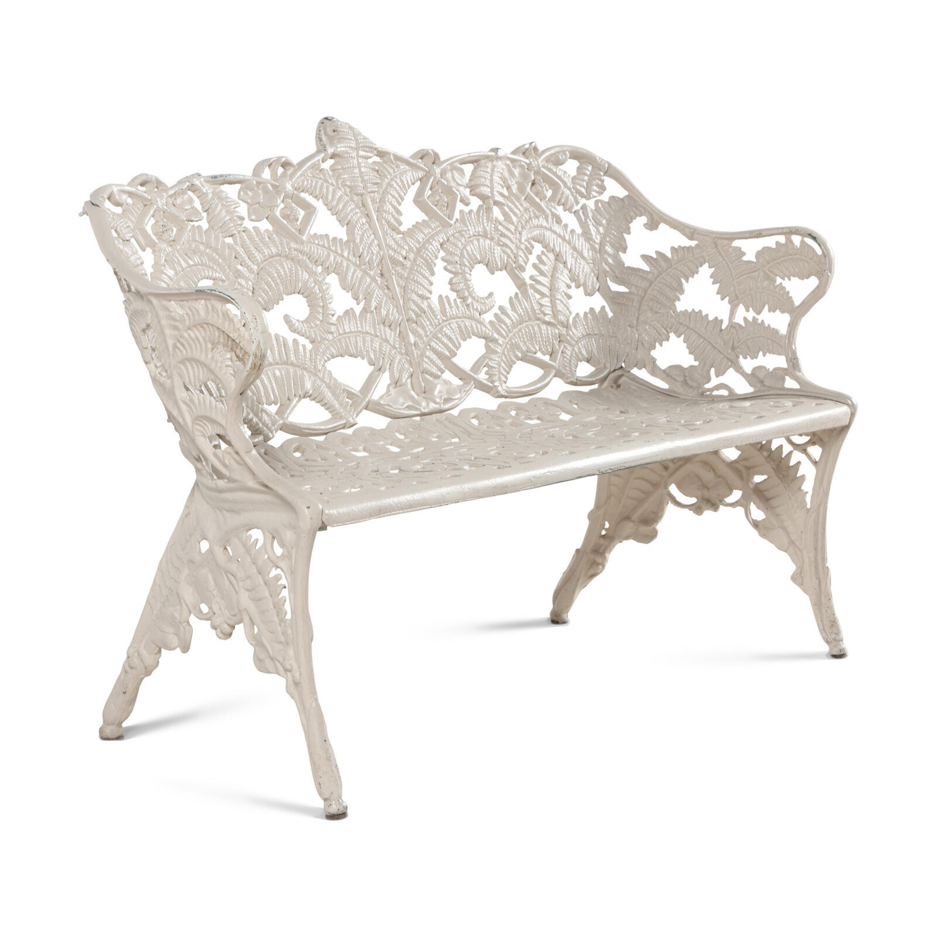 A Four-Piece Cast Iron Garden Seating Suite