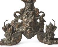 A large pair of Renaissance Revival bronze andirons, possibly Venice, Italy, 19th century