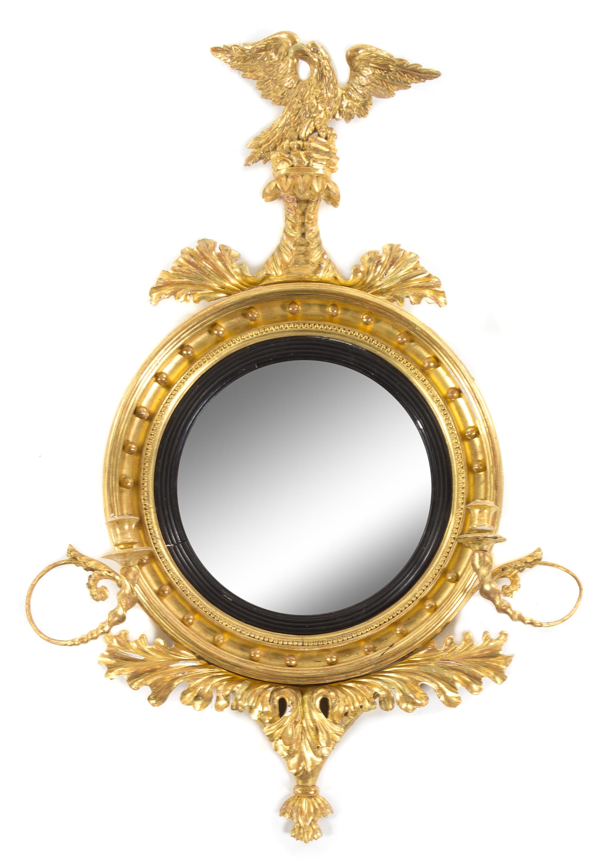 A Regency Giltwood Girandole Mirror Height 46 1/2 x width 30 1/2 inches. — CIRCA 1820