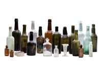 [AMERICANA]. Assembled collection of American glass and ceramic liquor and utility bottles.