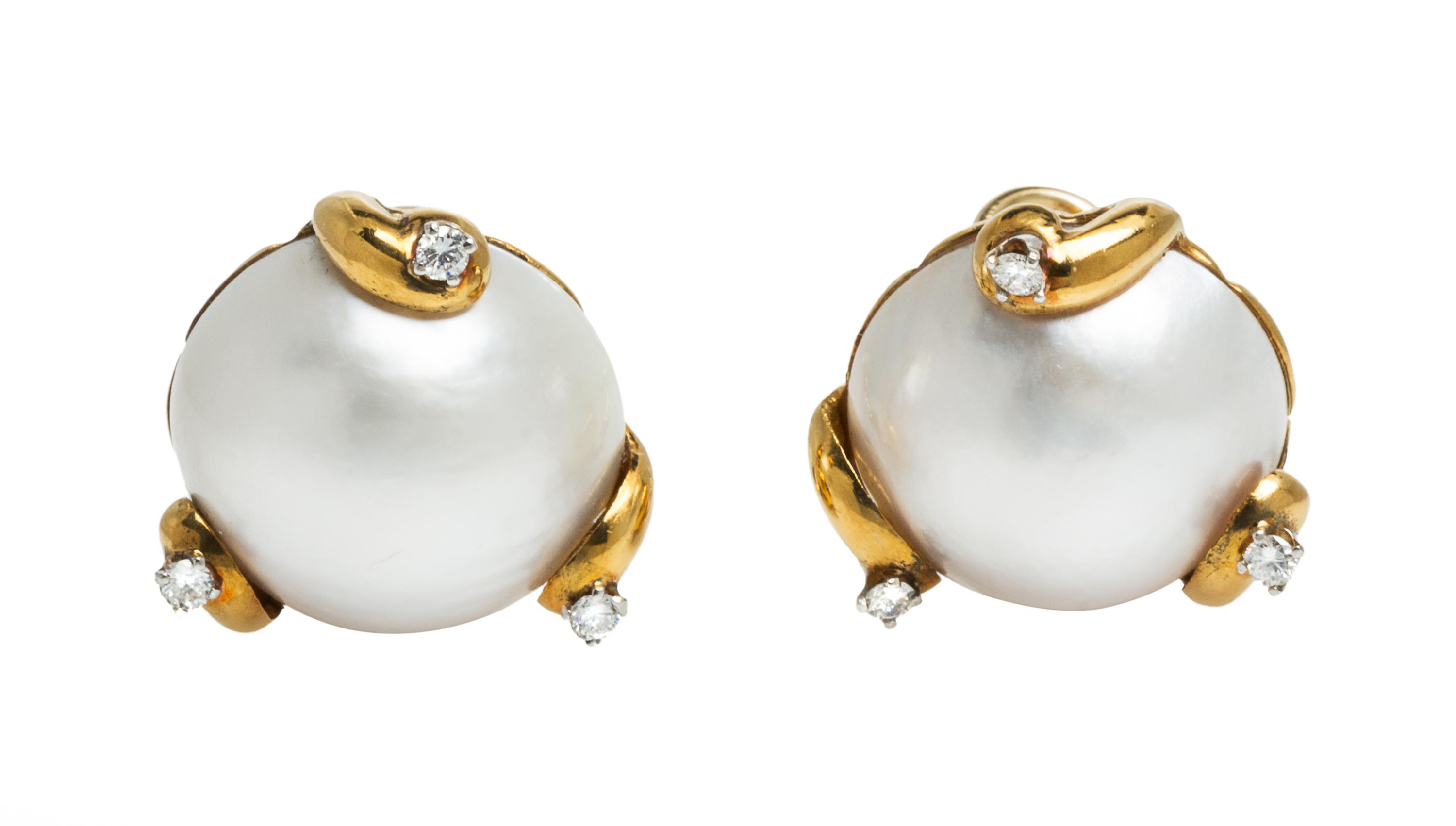 A Pair of 18 Karat Yellow Gold, Mabe Pearl and Diamond Earclips, 12.30 dwts.