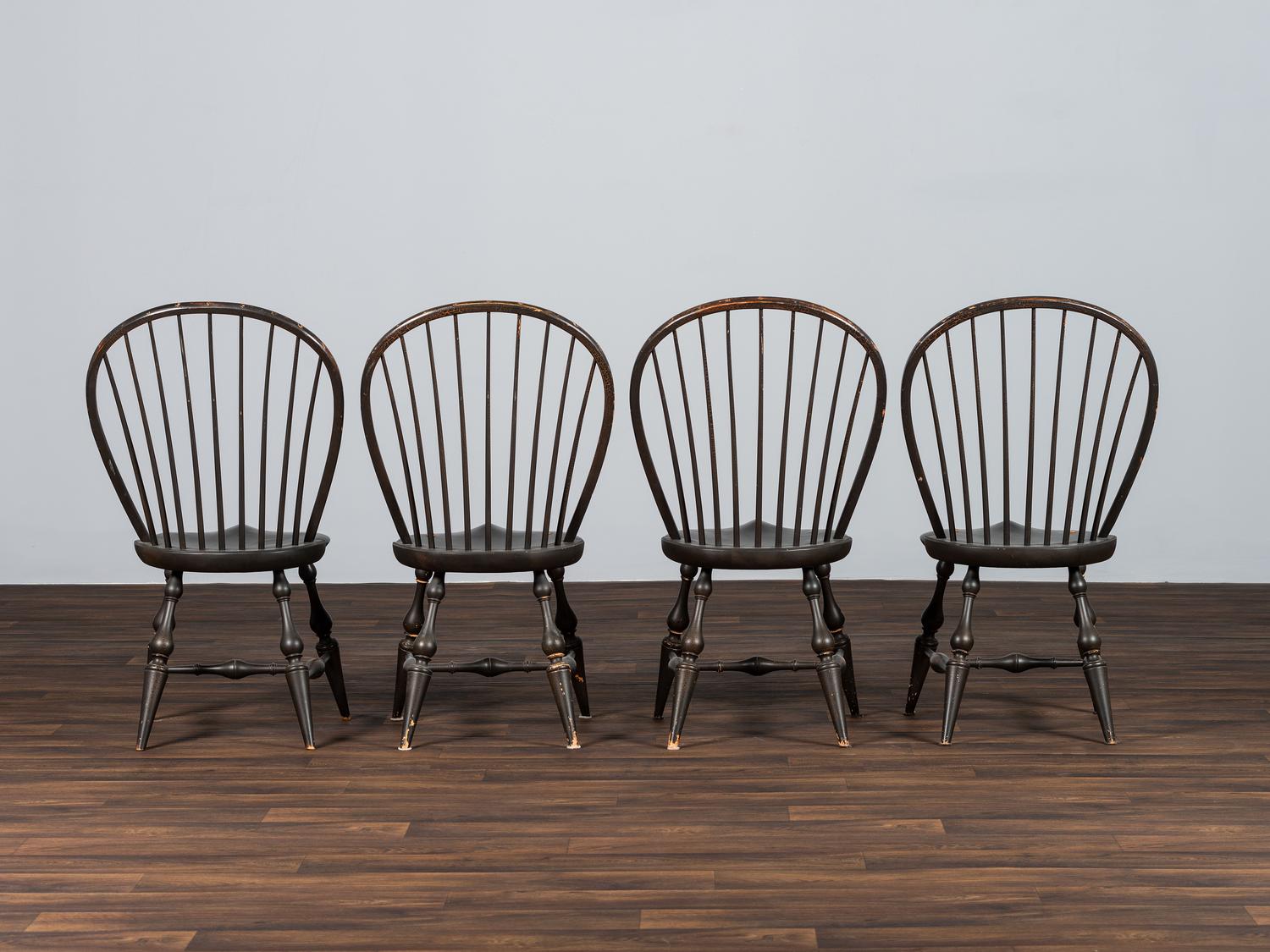 A Set of Four D.R. Dimes Black-Painted Hoop-Back Compass-Seat Windsor Chairs