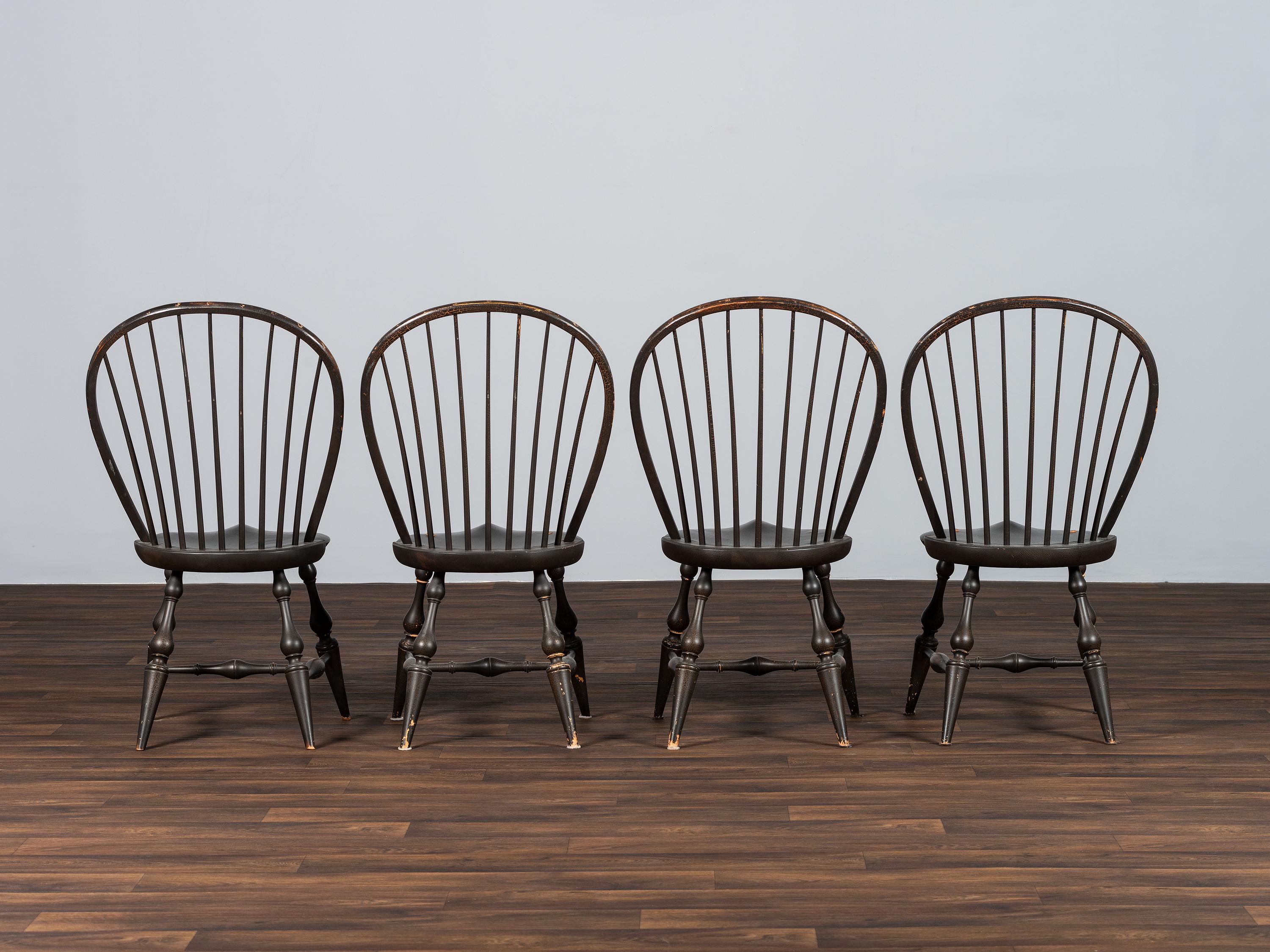 A Set of Four D.R. Dimes Black-Painted Hoop-Back Compass-Seat Windsor Chairs