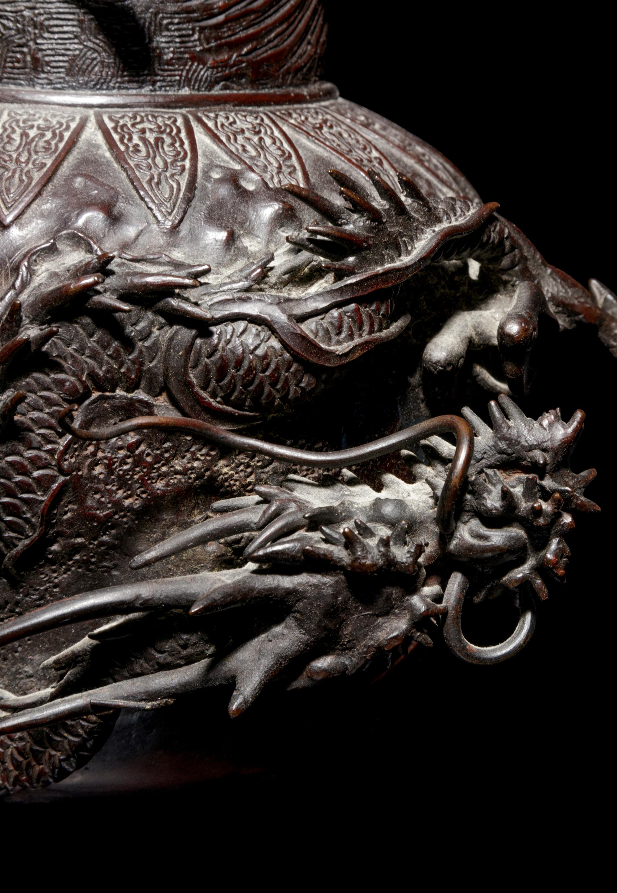 A Pair of Bronze Dragon Vases