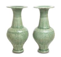 A Pair of Chinese Celadon Glazed Porcelain Vases Height 19 1/4 inches.