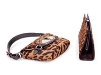 Four Animal Print Pieces: One Lambertson Truex Frame Clutch Bag, One Valentino Double Flap Bag, One Pair of Gucci Sling Back Shoes, One Pair of Louboutin Boots