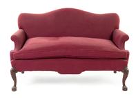 An Irish Mahogany Camel Back Settee Width 55 inches. — 19TH CENTURY