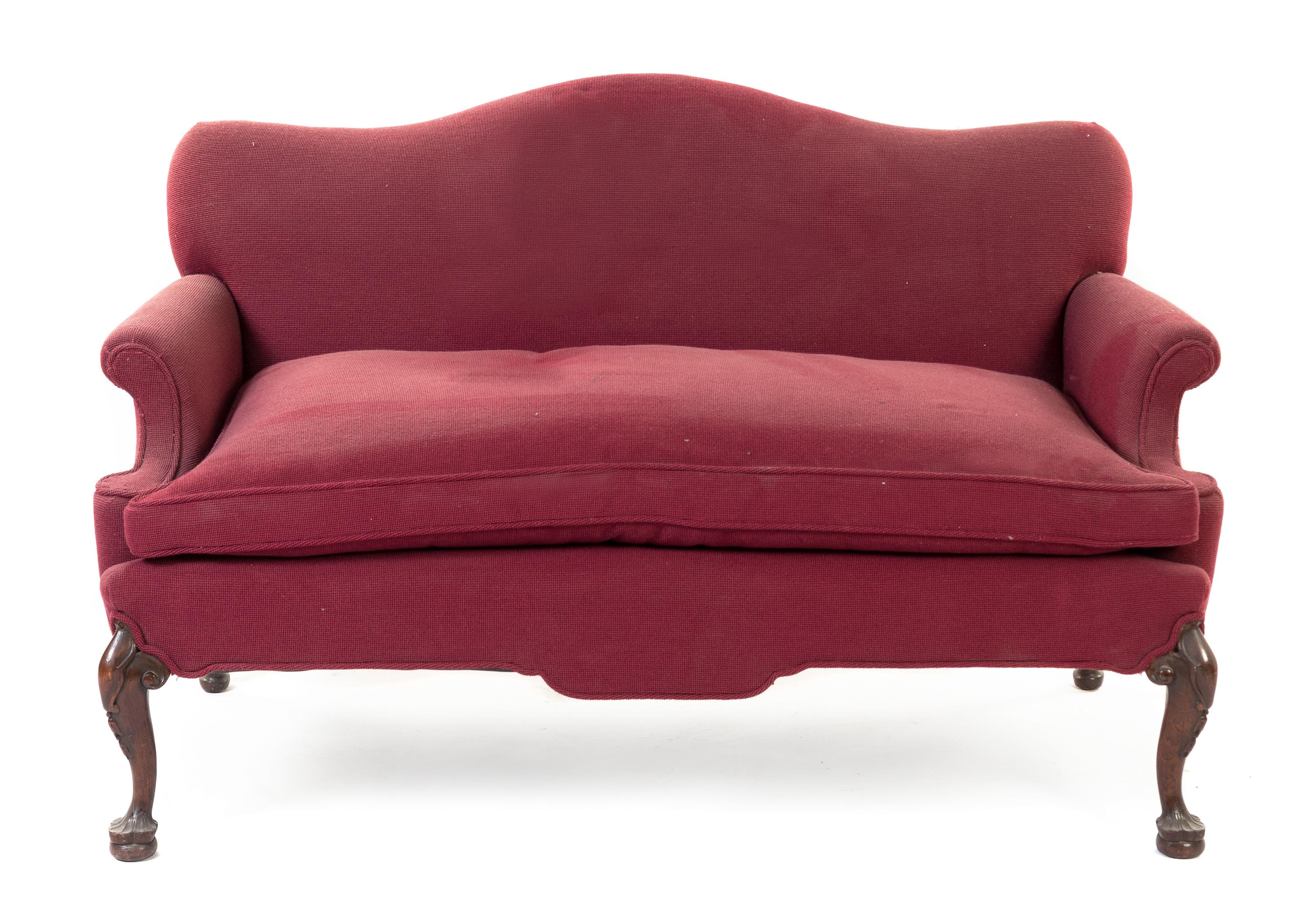 An Irish Mahogany Camel Back Settee Width 55 inches. — 19TH CENTURY