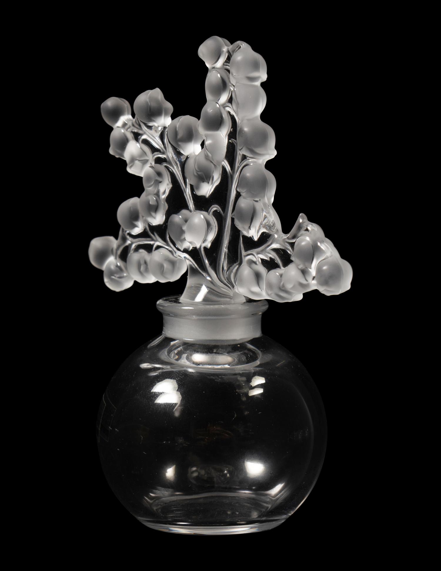 A Group of Four Lalique Dresser Articles
