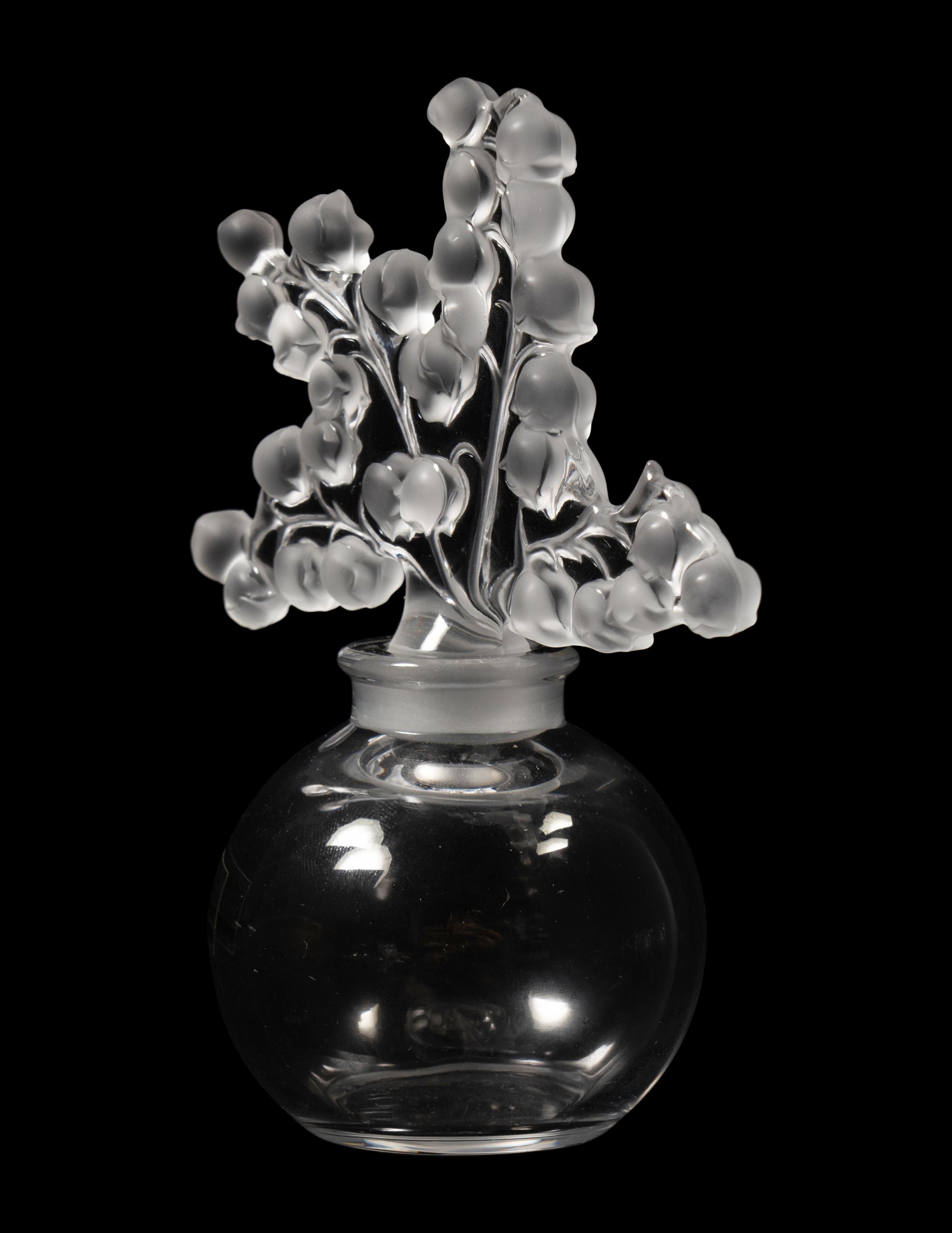 A Group of Four Lalique Dresser Articles