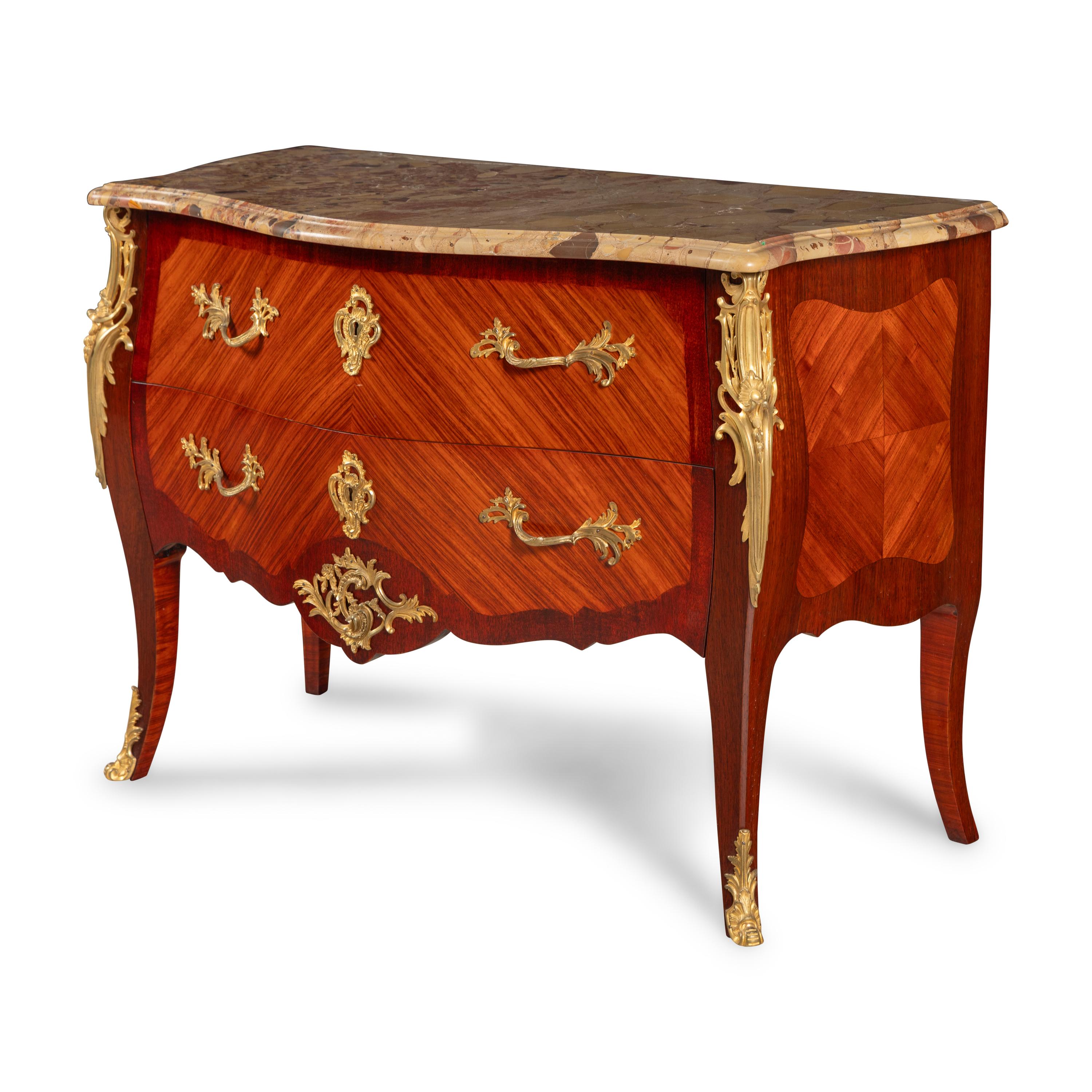 A Louis XV Style Gilt Bronze Mounted Mahogany, Kingwood and Breche d'Alep Marble-Top Commode