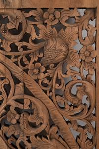 A Southeast Asian Carved Teakwood Mandala Panel