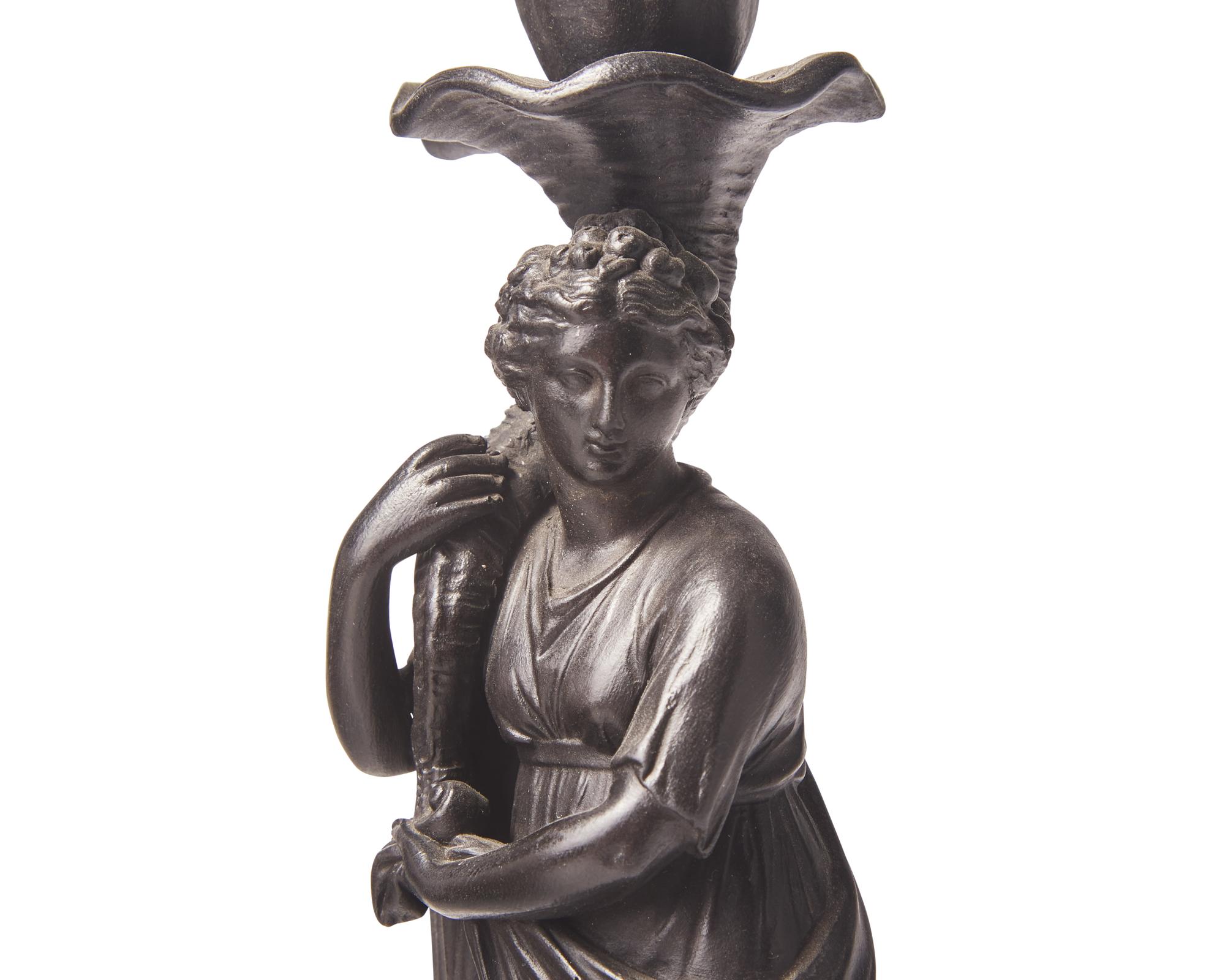A Wedgwood Black Basalt 'Ceres' Figural Candlestick