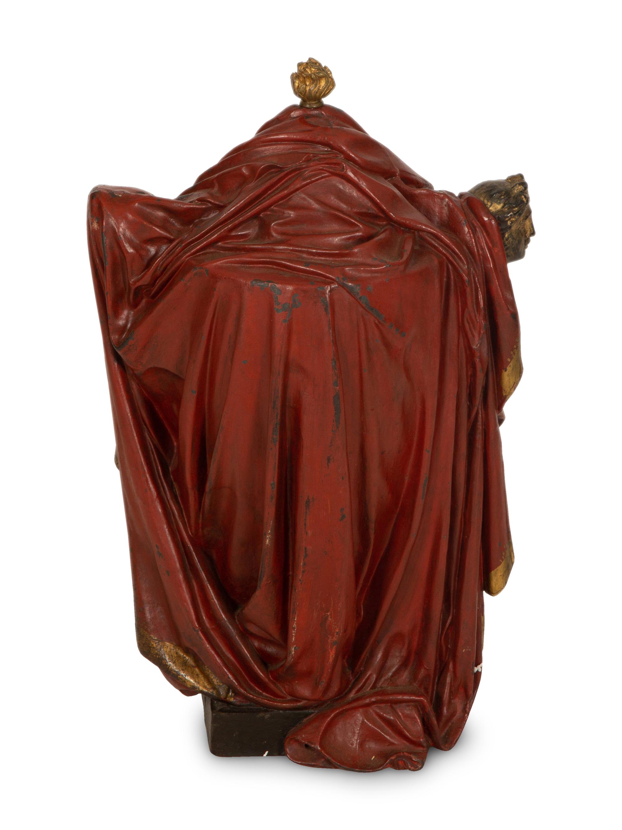 A Regency Style Painted and Parcel Gilt Cast Iron Urn