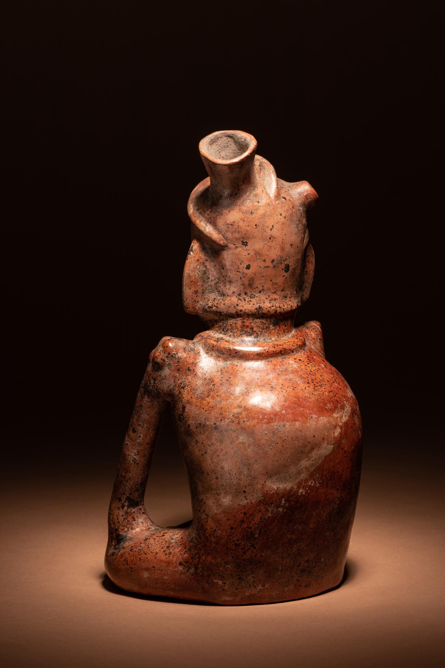 A Colima Terracotta Seated Figure