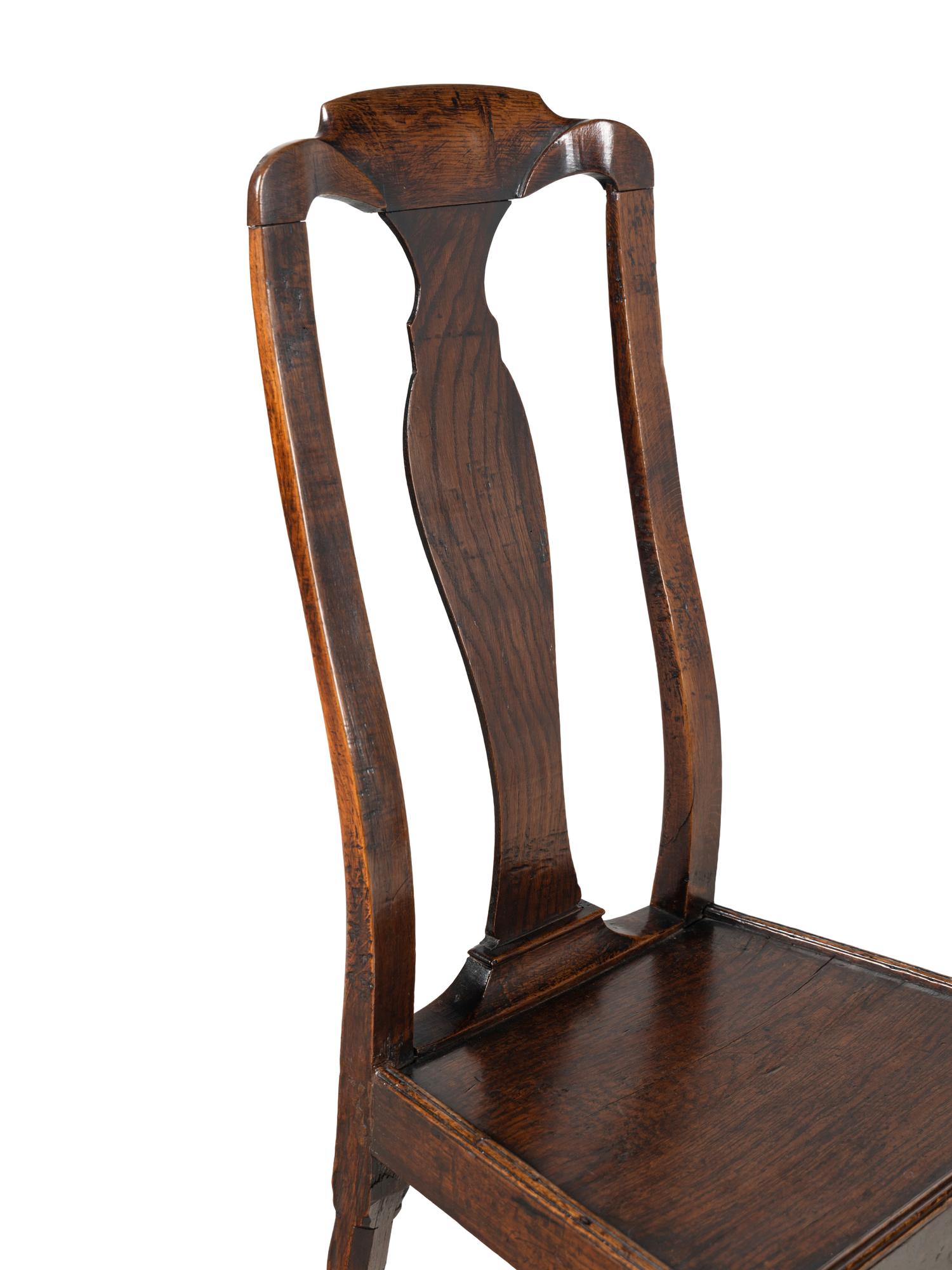 A Pair of Queen Anne Oak 'Solid Seat' Side Chairs