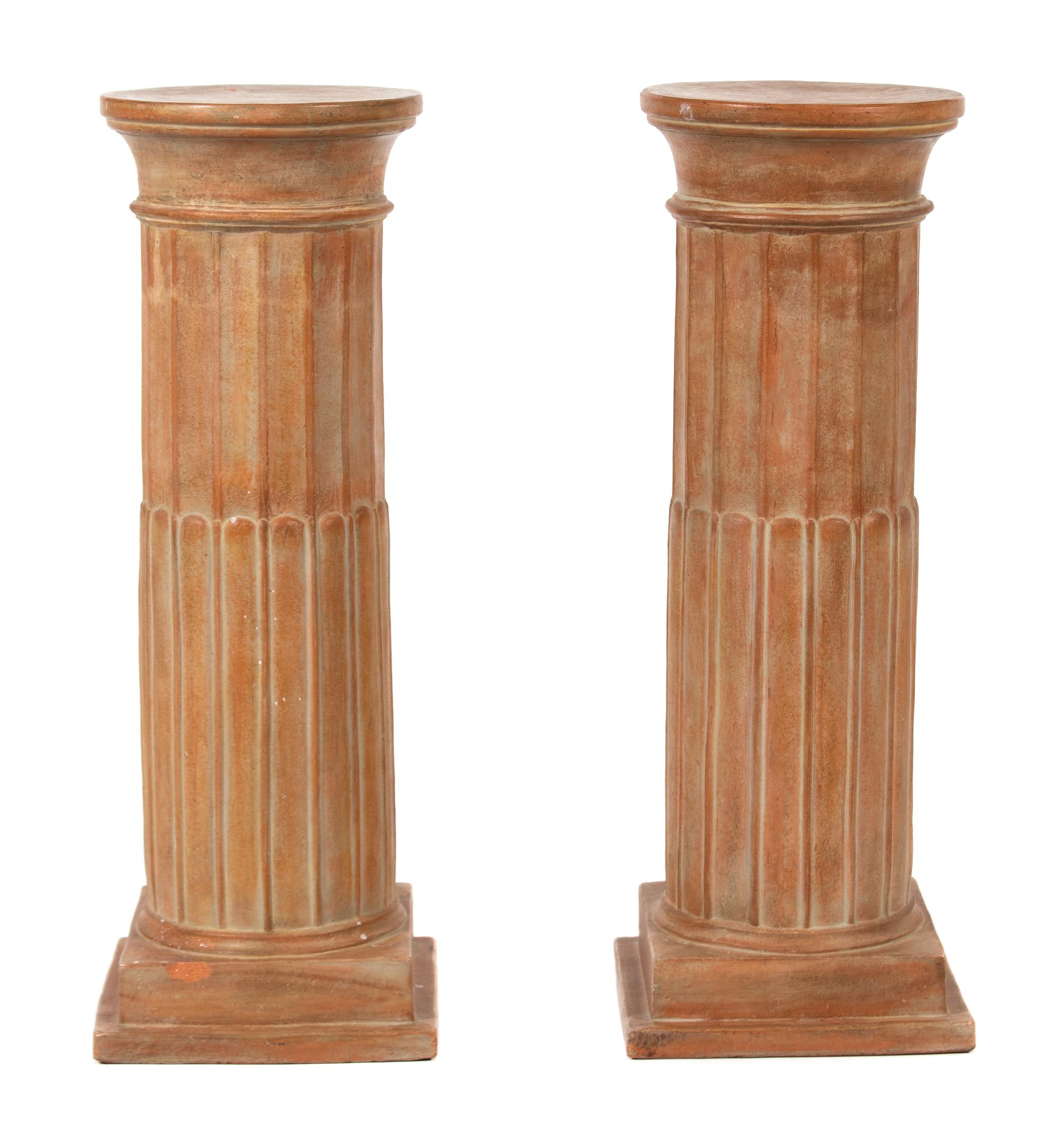 A Pair of Terra-Cotta Fluted Columnar-Form Pedestals Height 37 x diameter 12 1/2 inches. — 20TH CENTURY