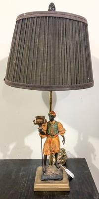 A Continental Polychrome Decorated Figure Height of figure 9 inches. — 20TH CENTURY