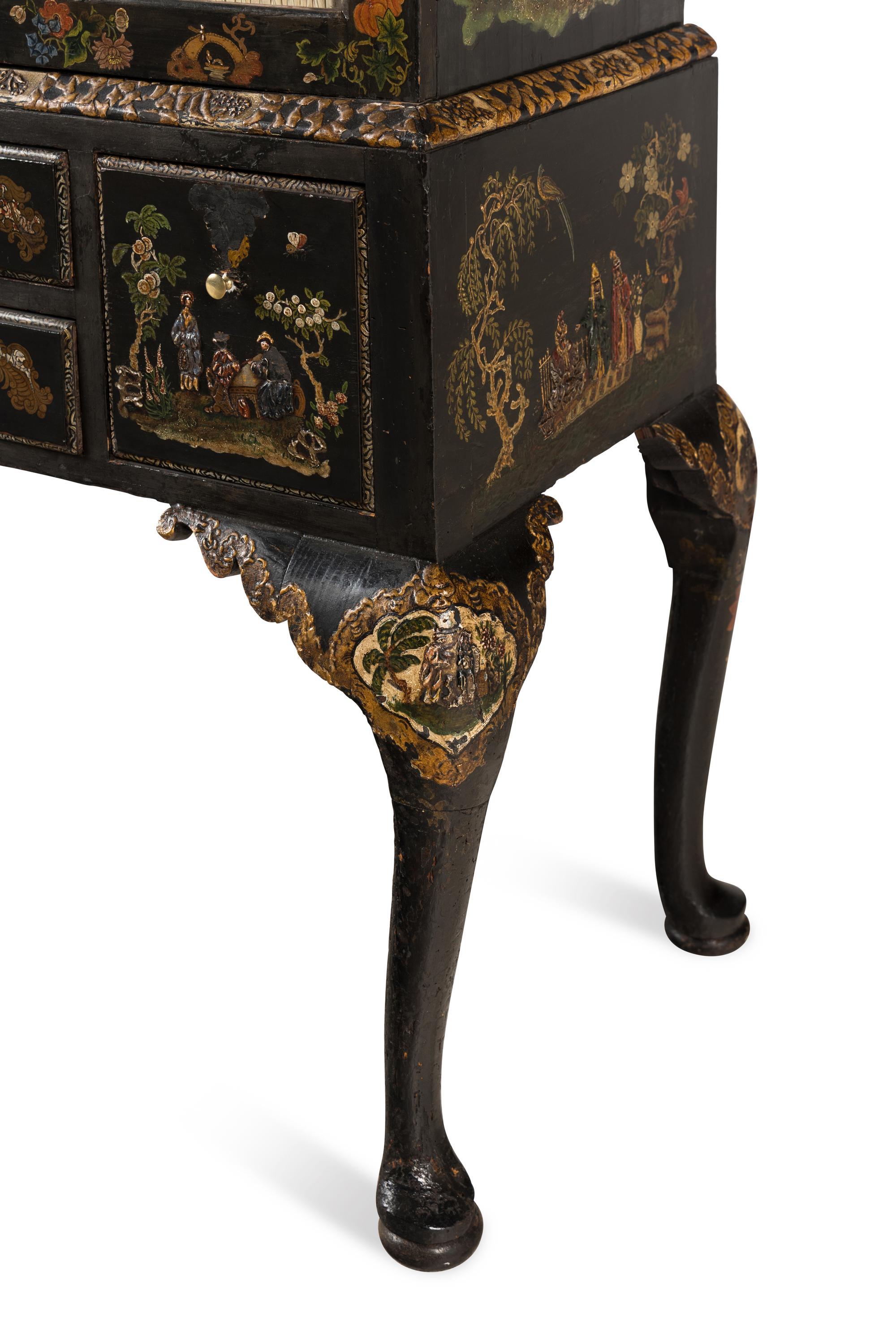 A Queen Anne Style Polychrome and Black Japanned Bookcase on Stand