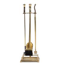 A Set of Brass Fireplace Tools