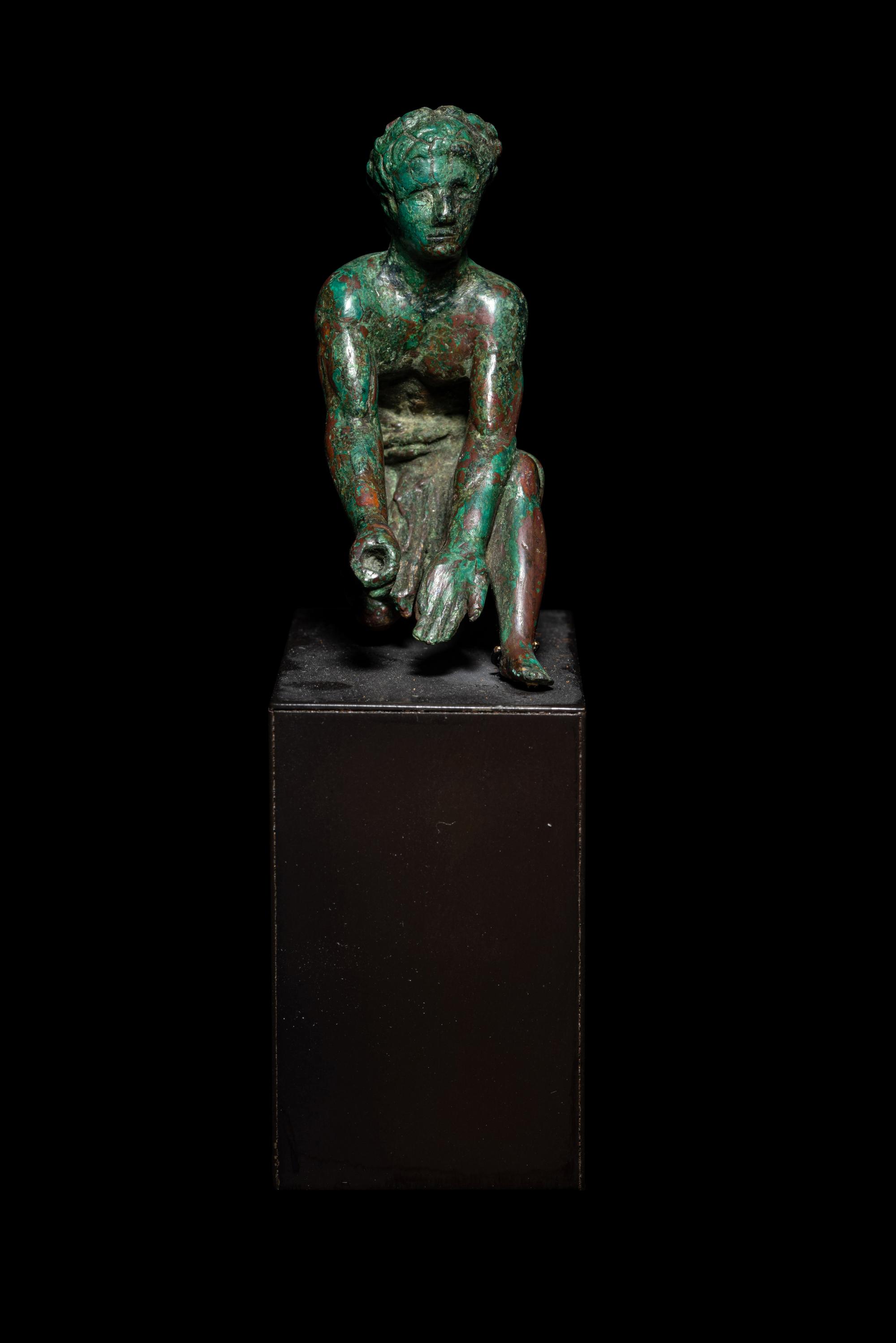 A Roman Bronze Kneeling Priest