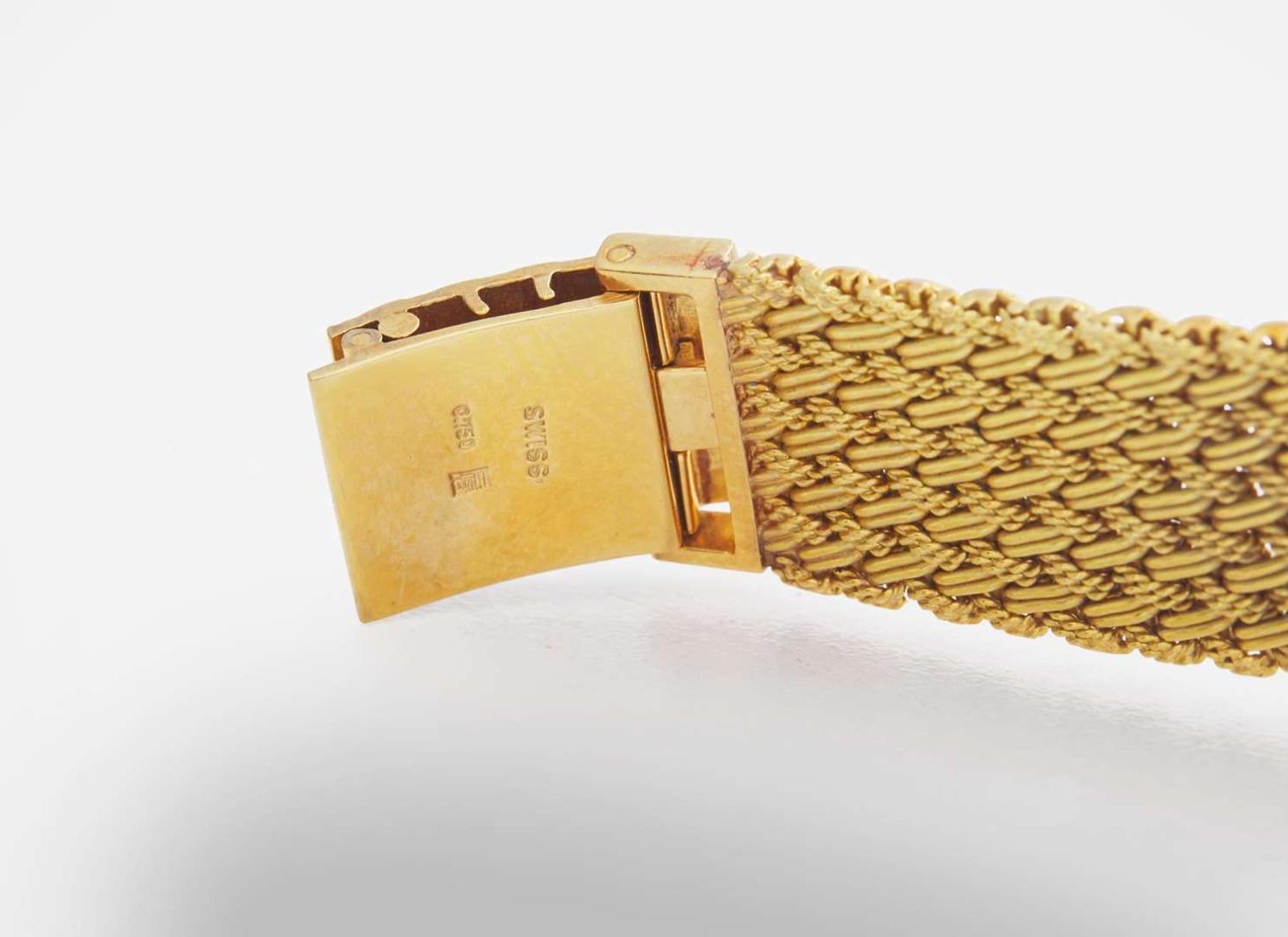 A Ladies 18K Yellow Gold Bueche Girod Watch