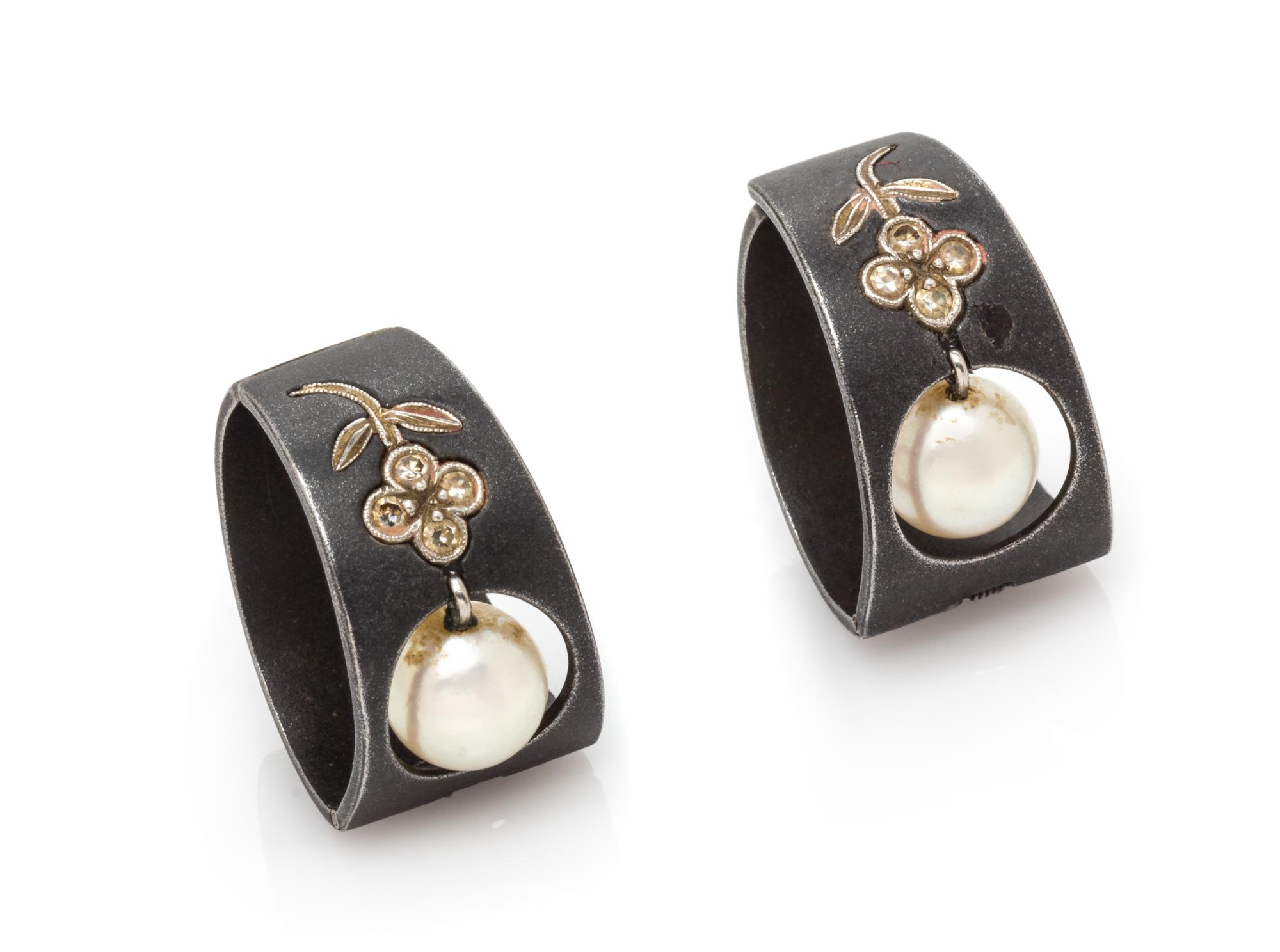 A Pair of Art Moderne Blackened Steel, White Gold, Cultured Pearl and Diamond Earclips, Marsh & Co., 5.80 dwts.