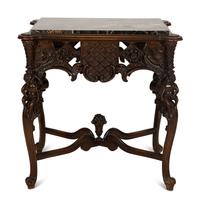 An Italian Rococo Style Carved Black Walnut Marble Top Side Table