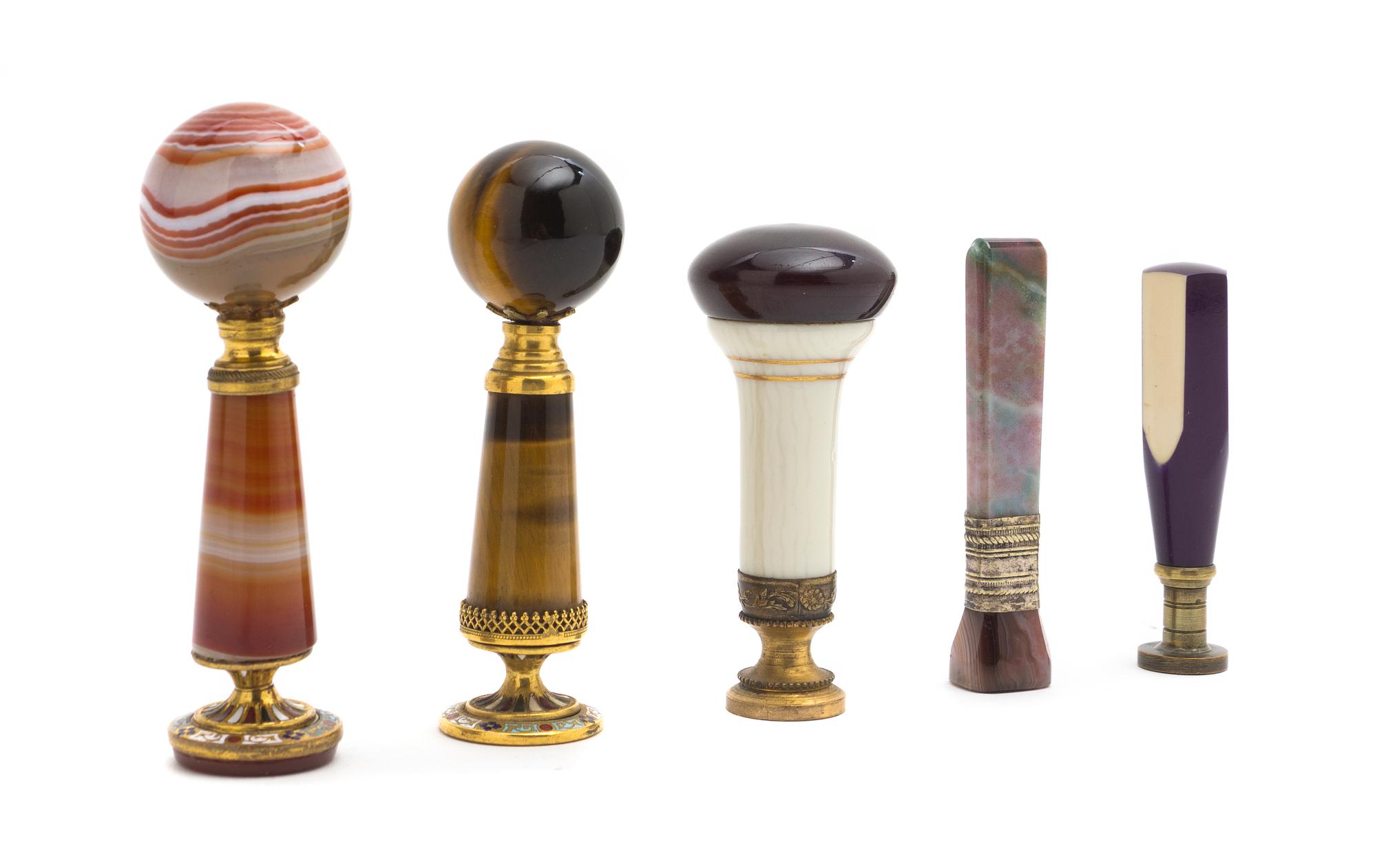 A Collection of Hardstone Mounted Seals, Height of tallest 4 inches.