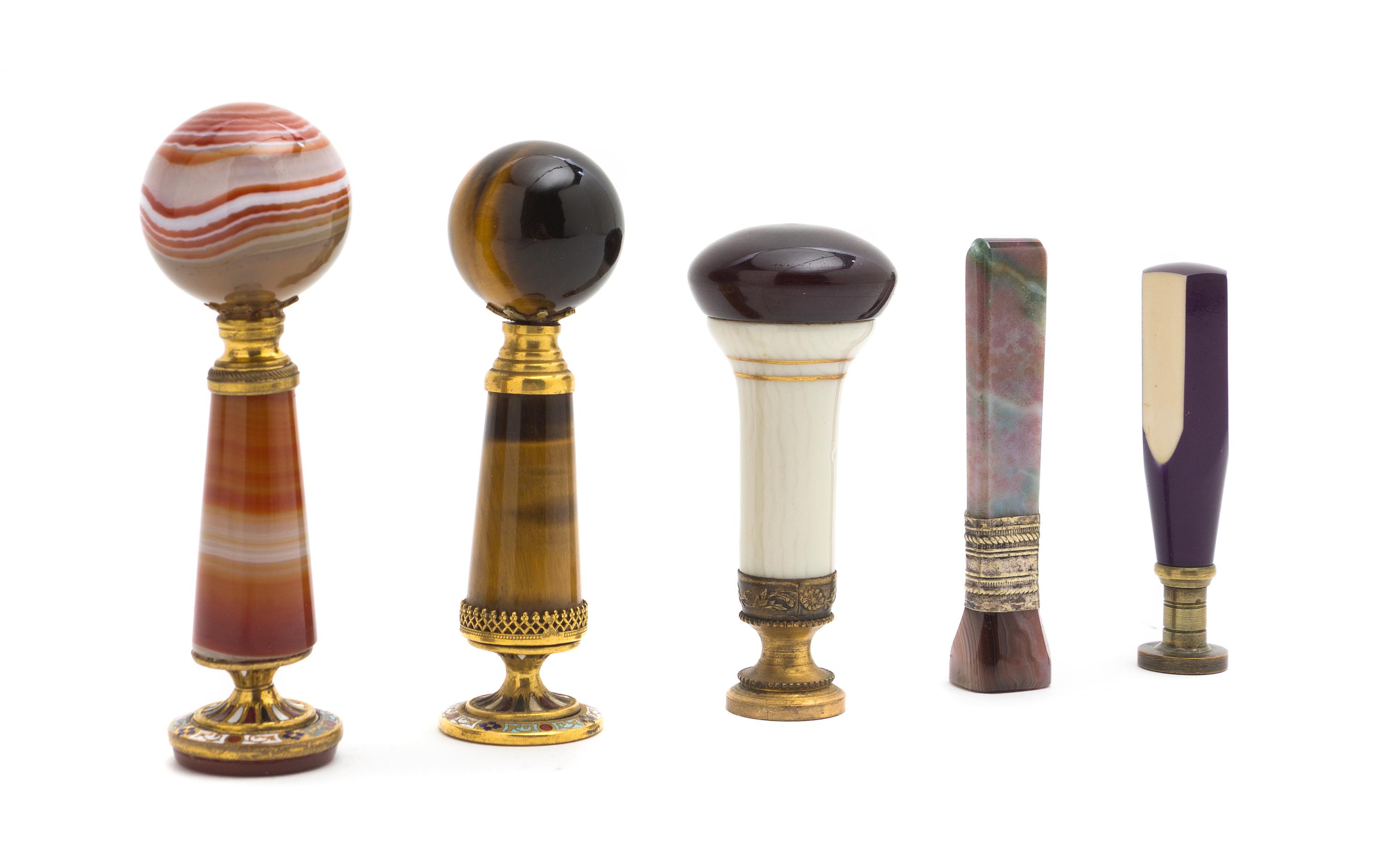 A Collection of Hardstone Mounted Seals, Height of tallest 4 inches.