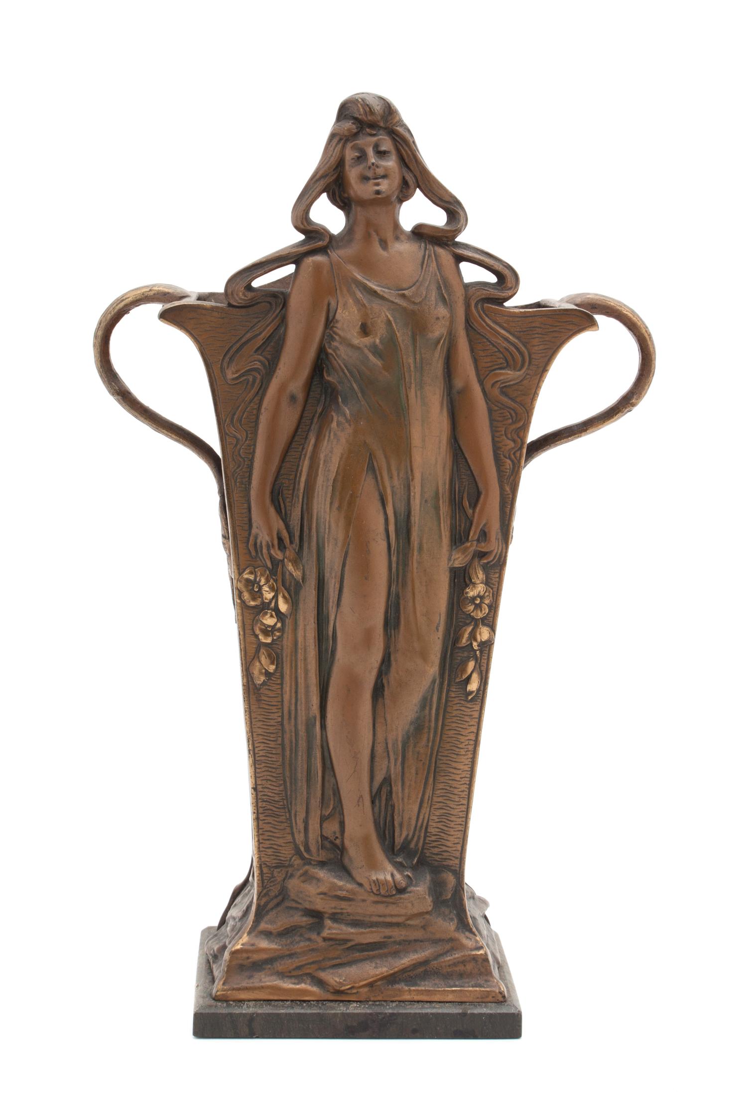 An Art Nouveau Brass Vase Height 14 inches.
