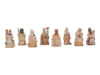 A Set of Eight Chinese Painted Soapstone Figures of Daoist Immortals