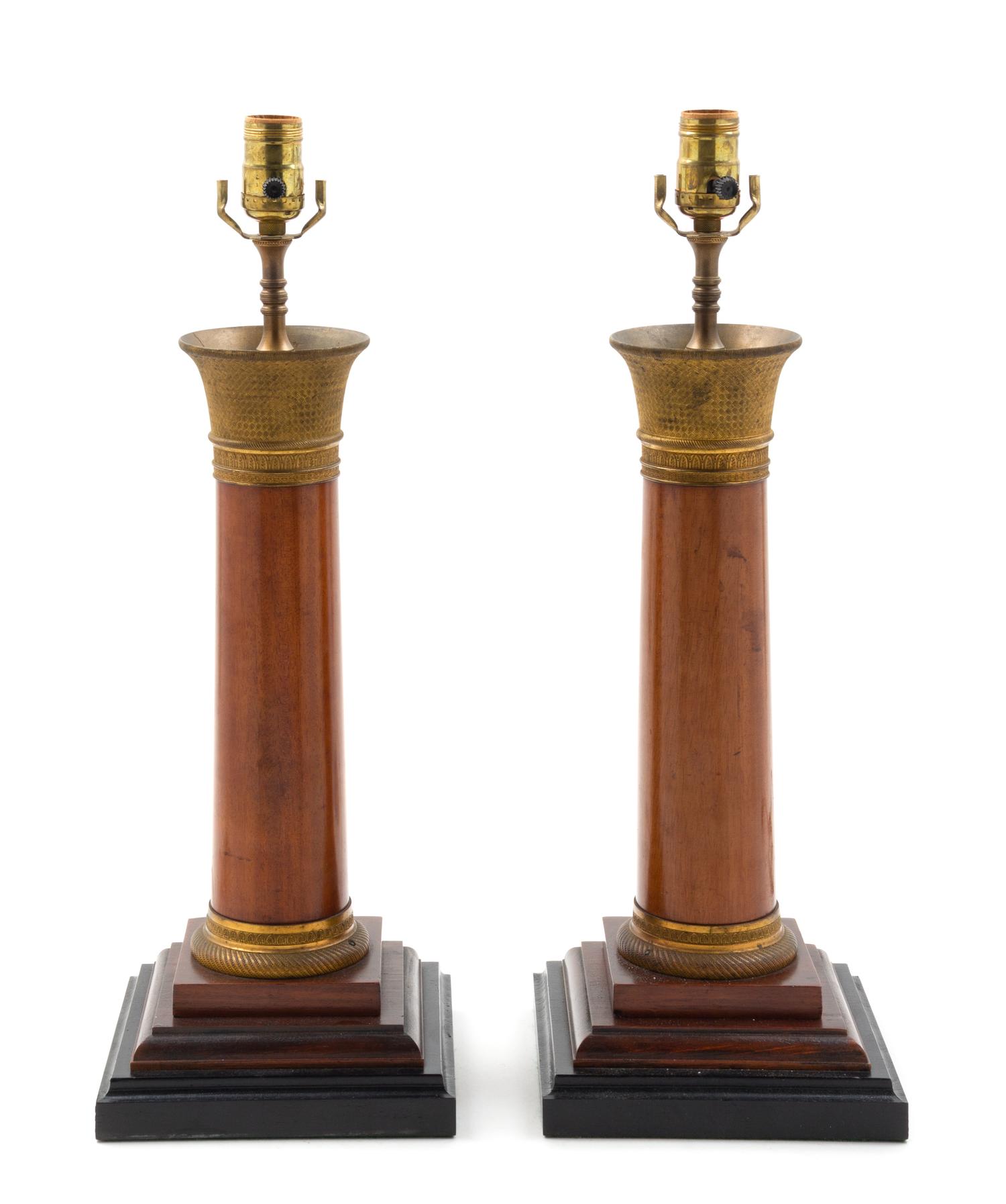A Pair of Empire Style Gilt Metal Mounted Mahogany Table Lamps Height overall 34 1/4 inches. — EARLY 20TH CENTURY