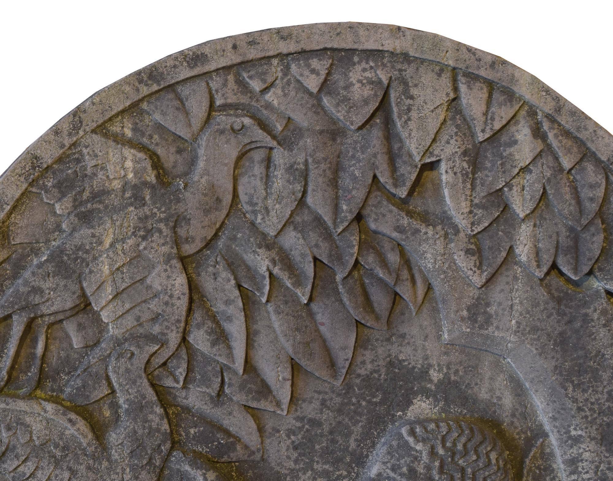 A Limestone Architectural Medallion from a Milwaukee Public School Building 31" W x 5.5" D x 47" H — United States, Circa 1940